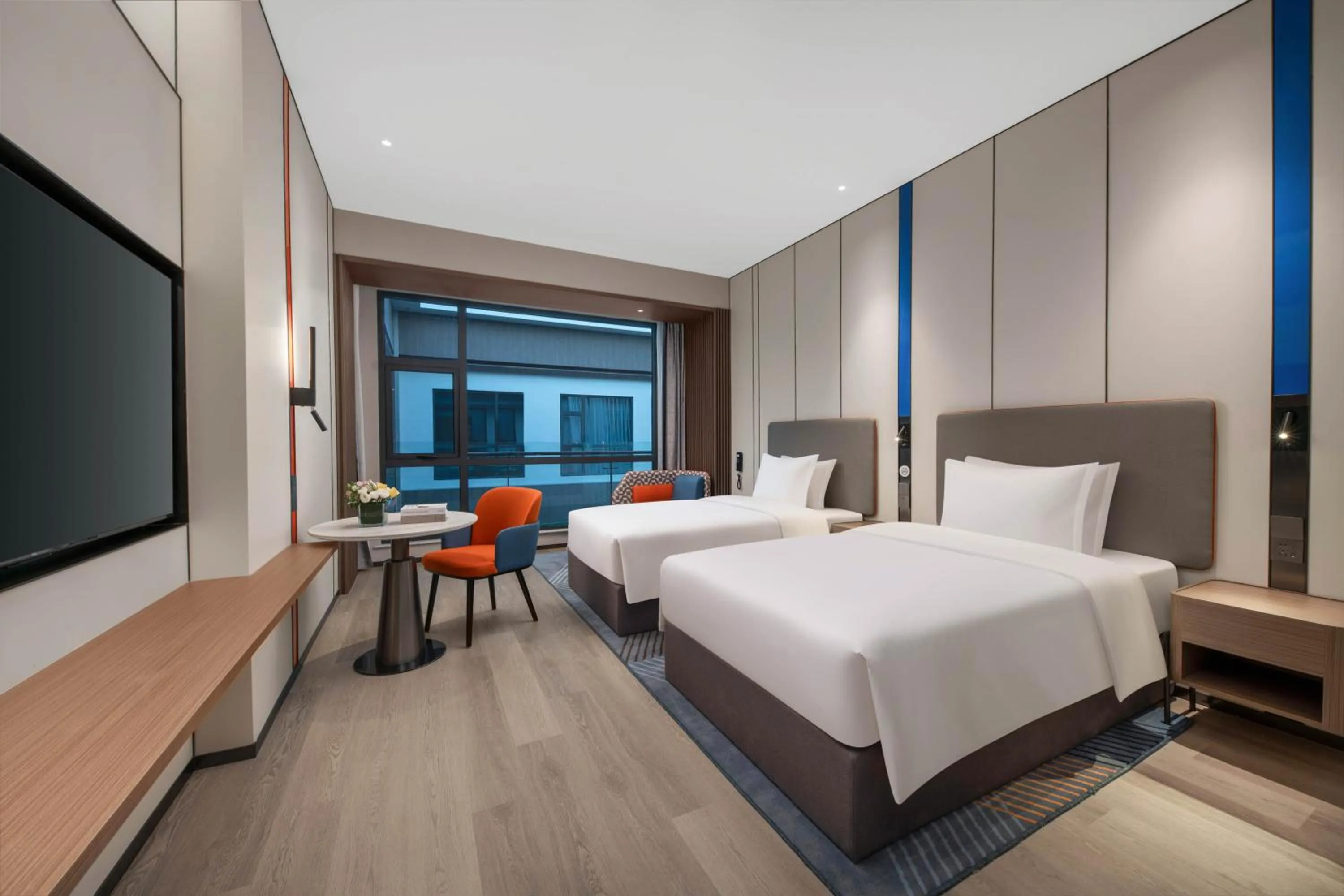 Photo of the whole room, Bed in Holiday Inn Express Hai'an Railway Station by IHG