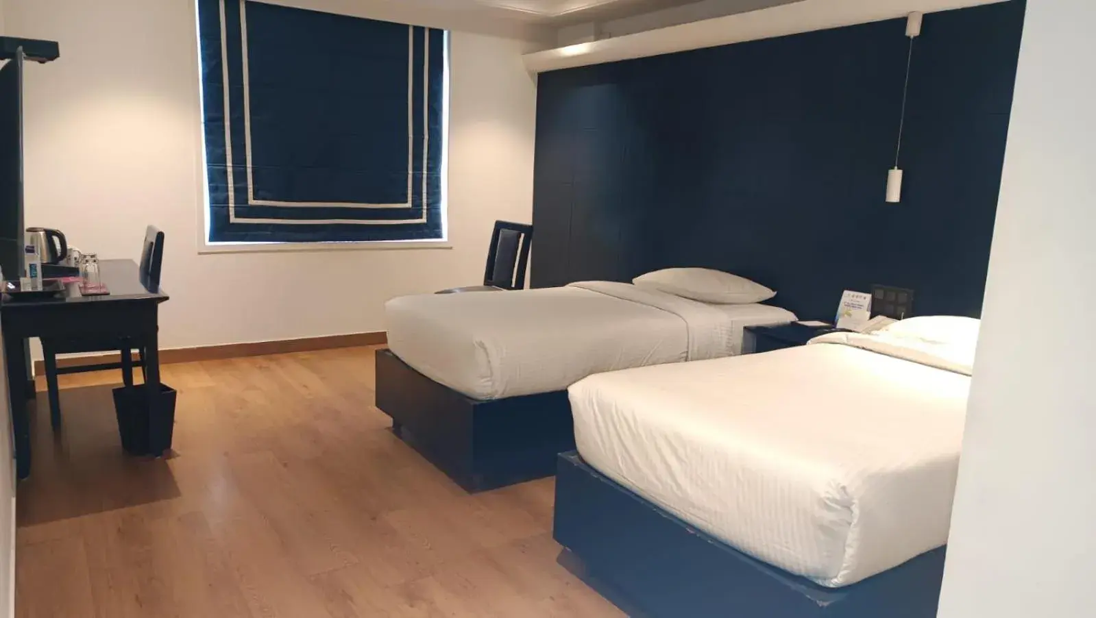 Twin Room in Regenta Inn Downton Raipur Twin Room in Regenta Inn Downton Raipur