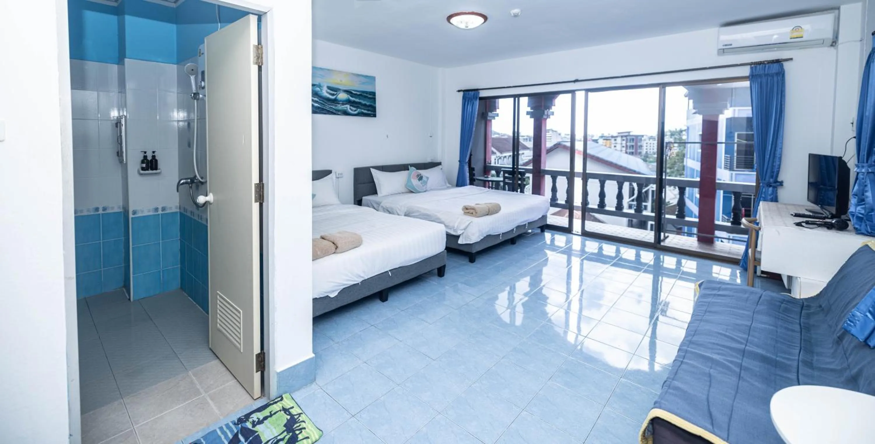 Bed in Belle Cose Guest House Phuket