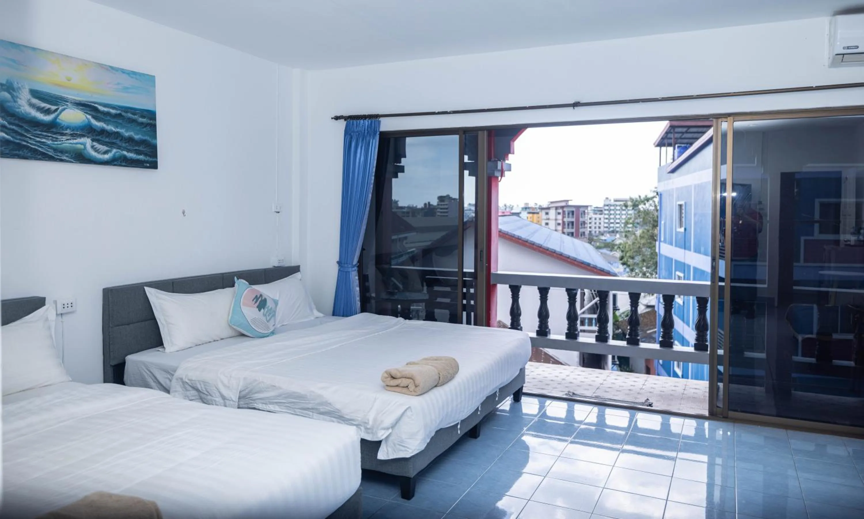 Bed in Belle Cose Guest House Phuket