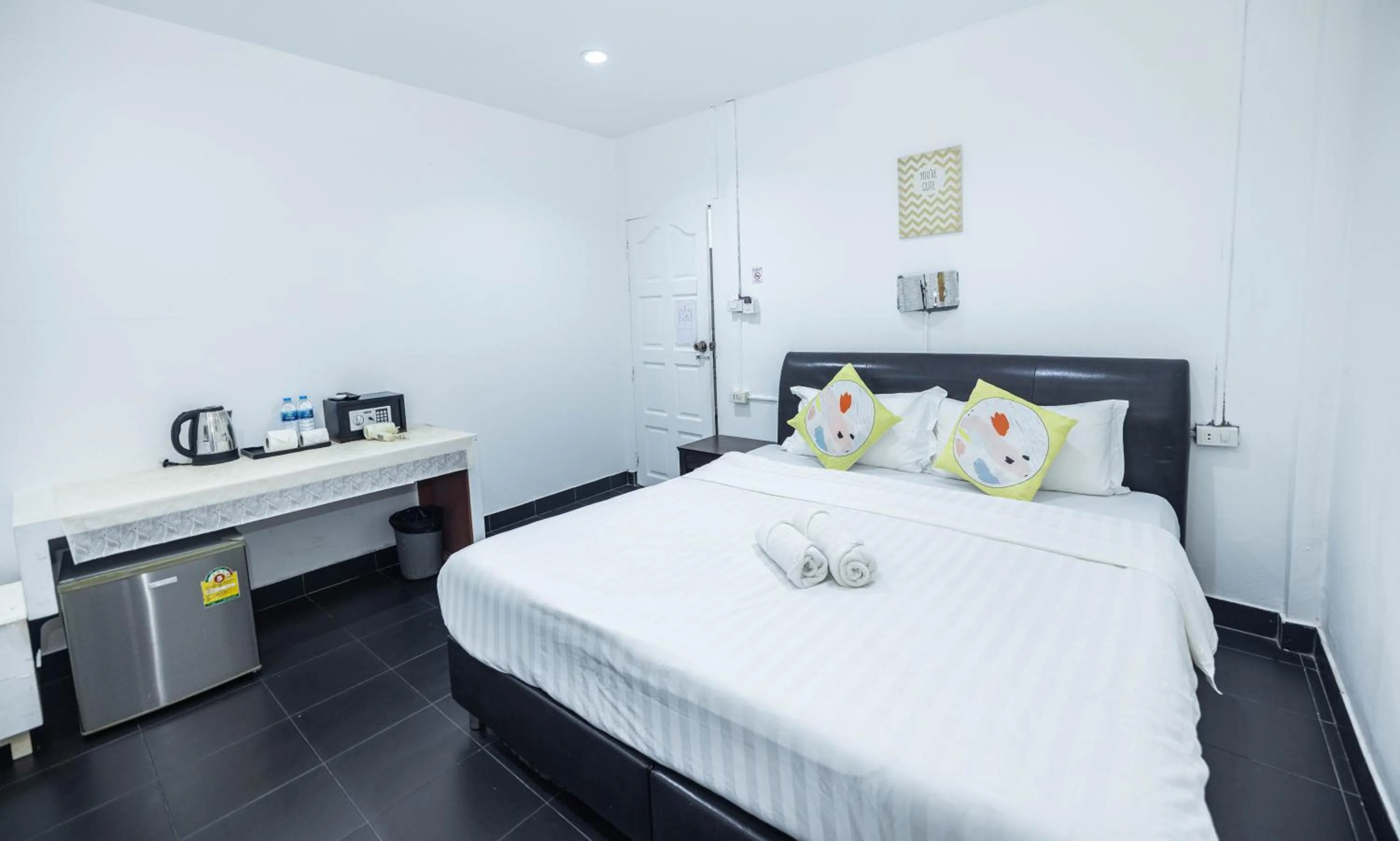 Bed in Belle Cose Guest House Phuket