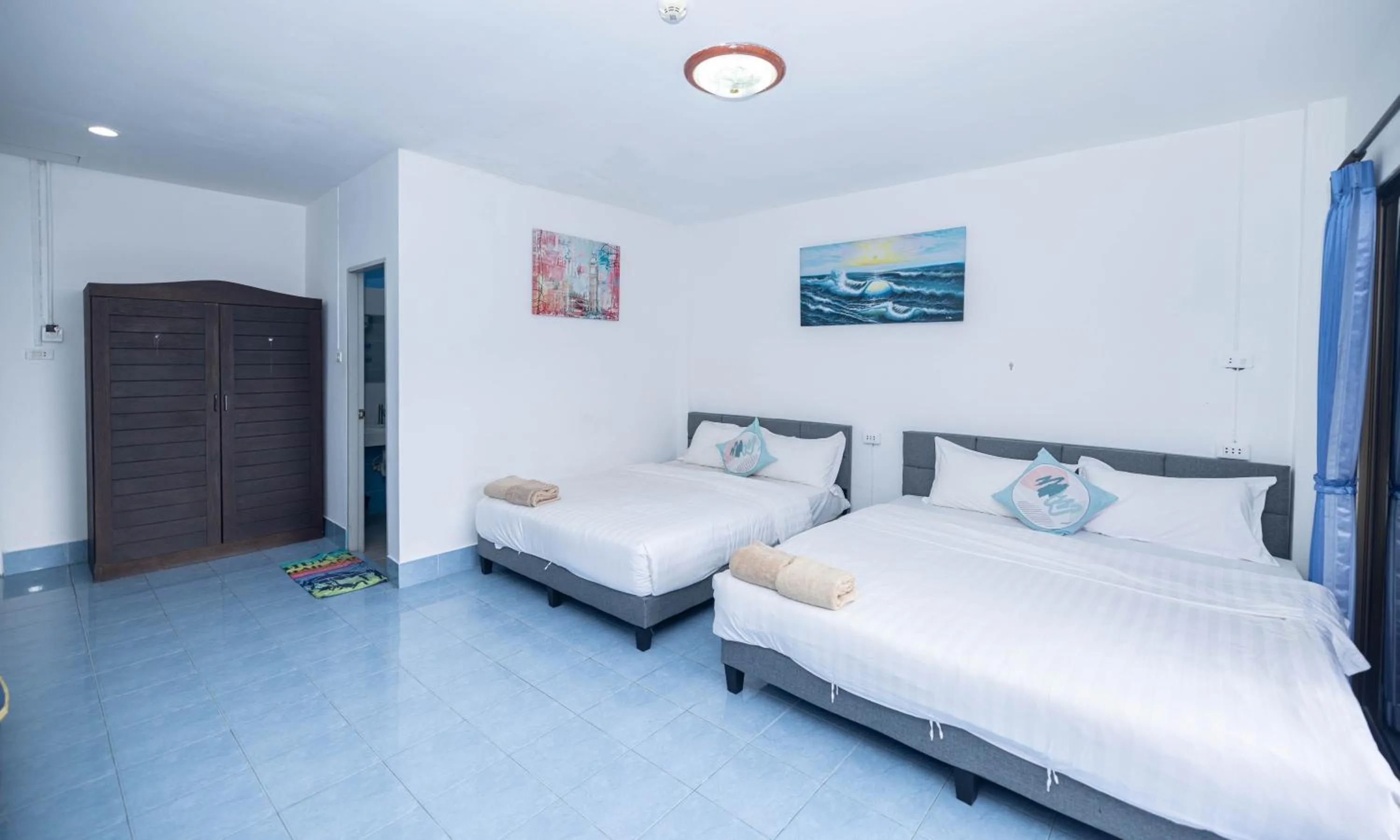 Bed in Belle Cose Guest House Phuket