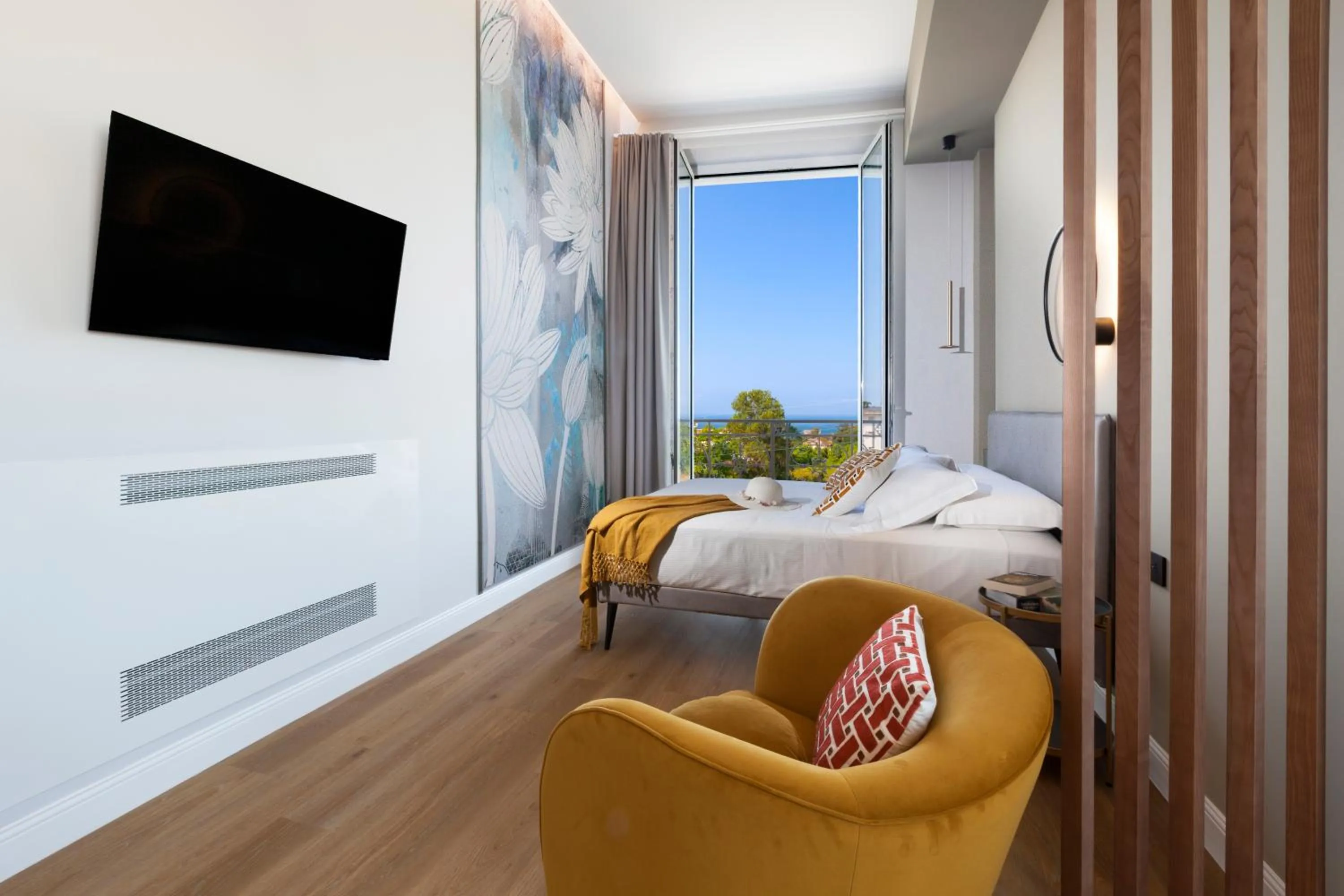 Bed in Vesuvius Palace Aparthotel