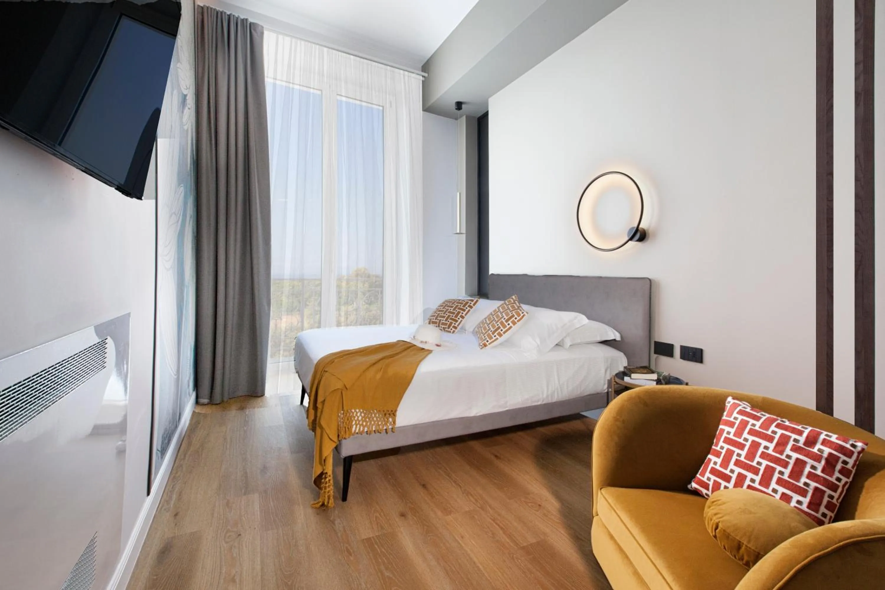 Bed in Vesuvius Palace Aparthotel