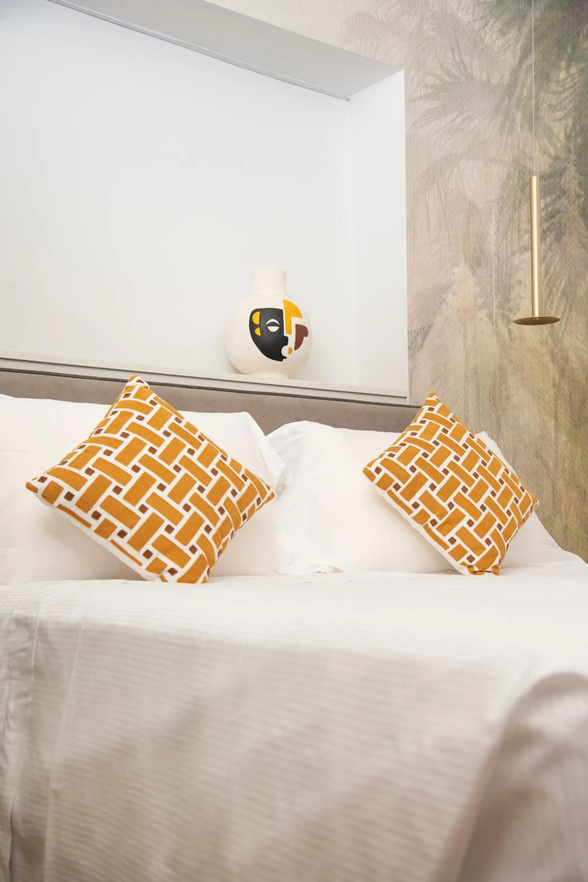 Bed in Vesuvius Palace Aparthotel