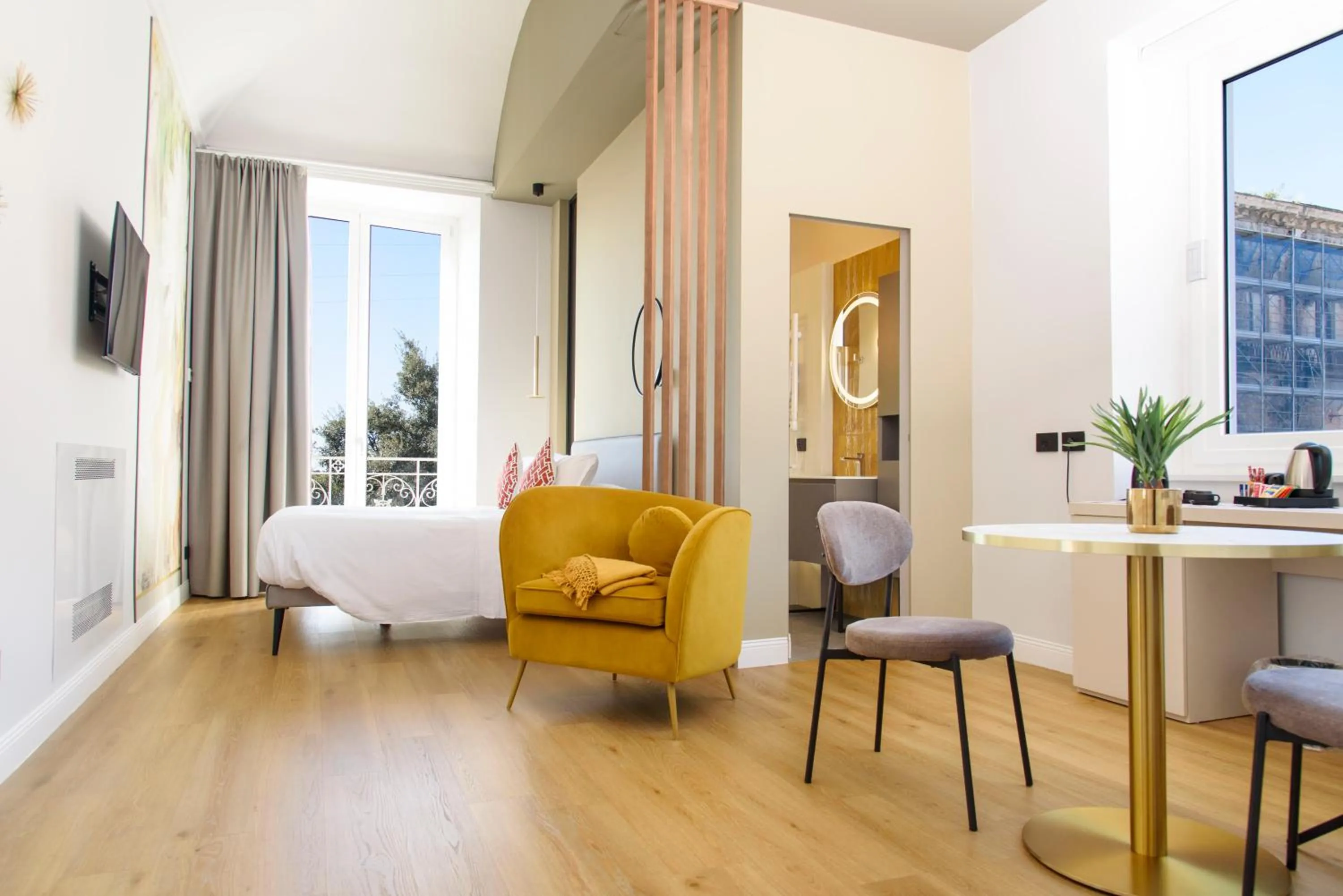 Bed in Vesuvius Palace Aparthotel