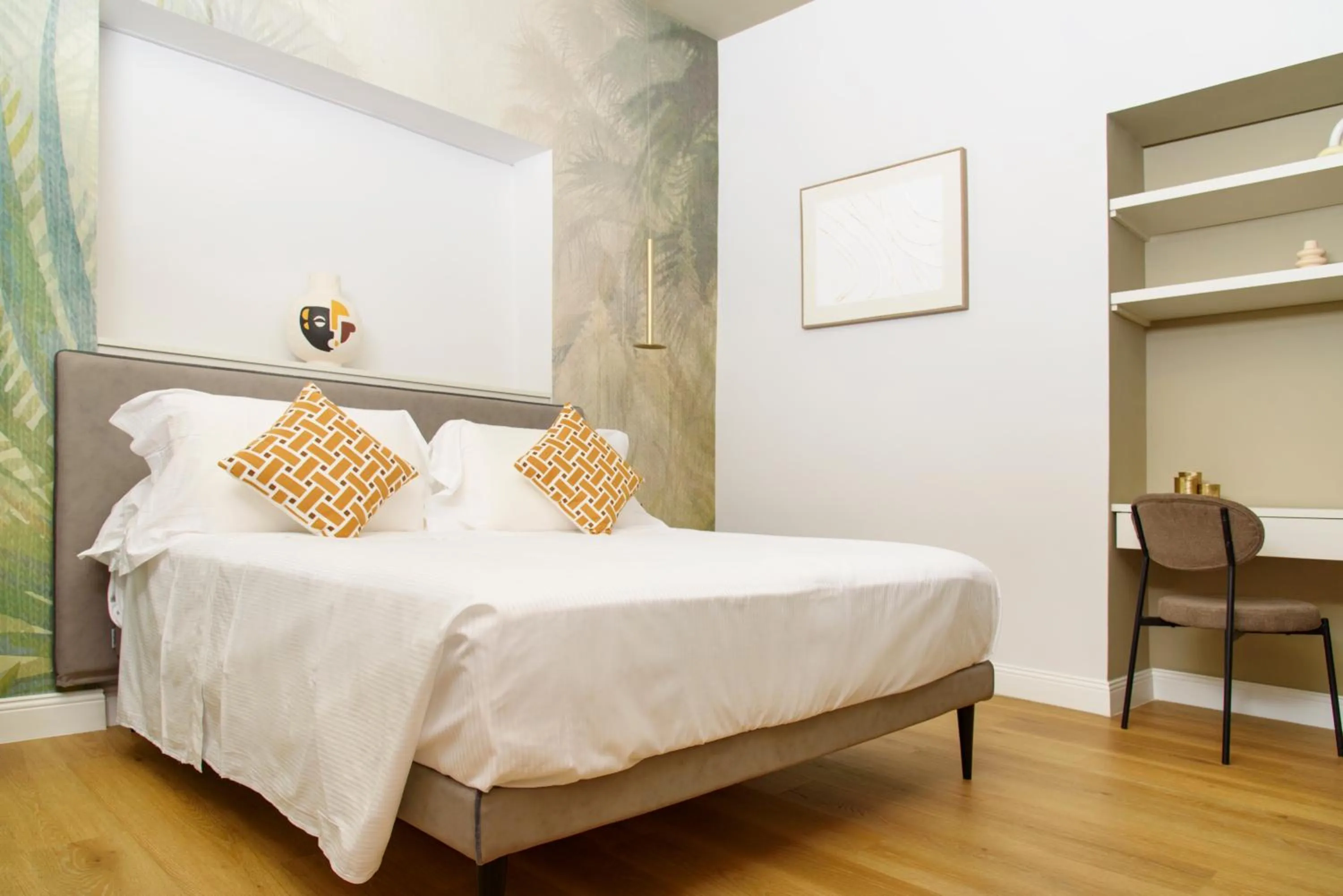 Bed in Vesuvius Palace Aparthotel