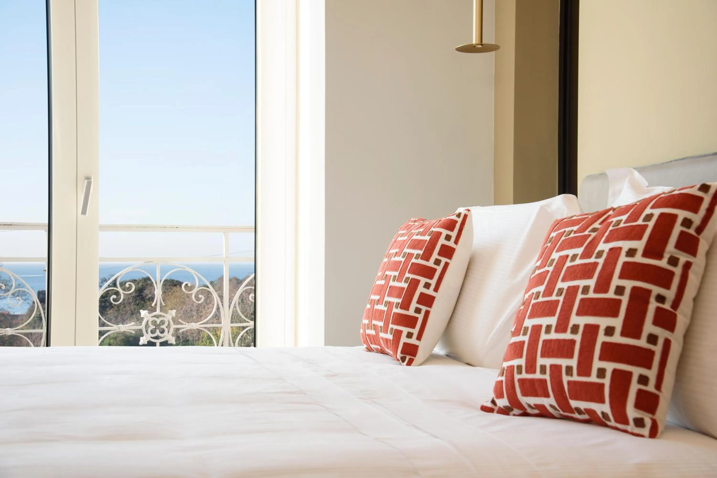 Bed in Vesuvius Palace Aparthotel