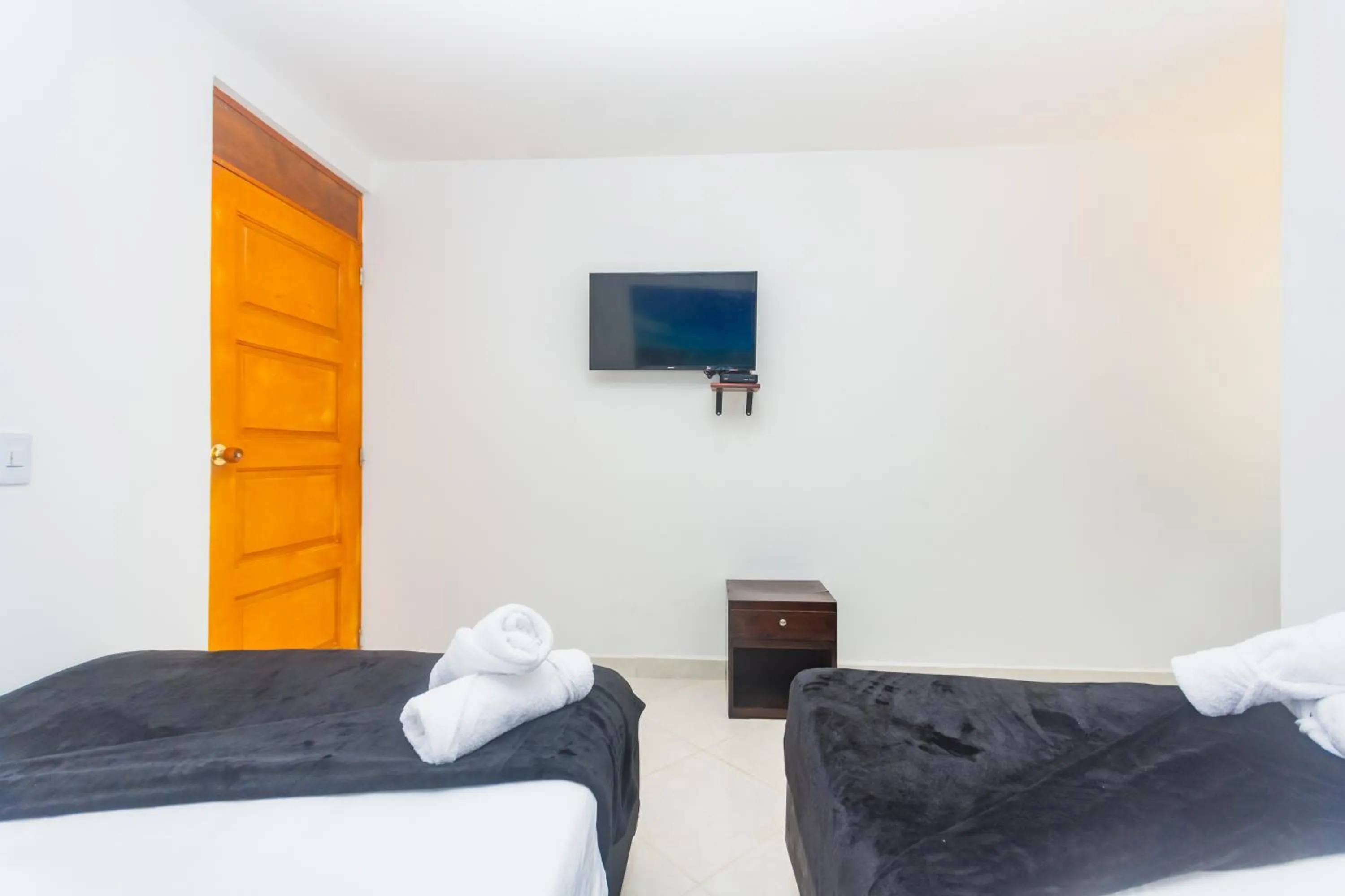 Bed in Hotel Tropical San Jeronimo