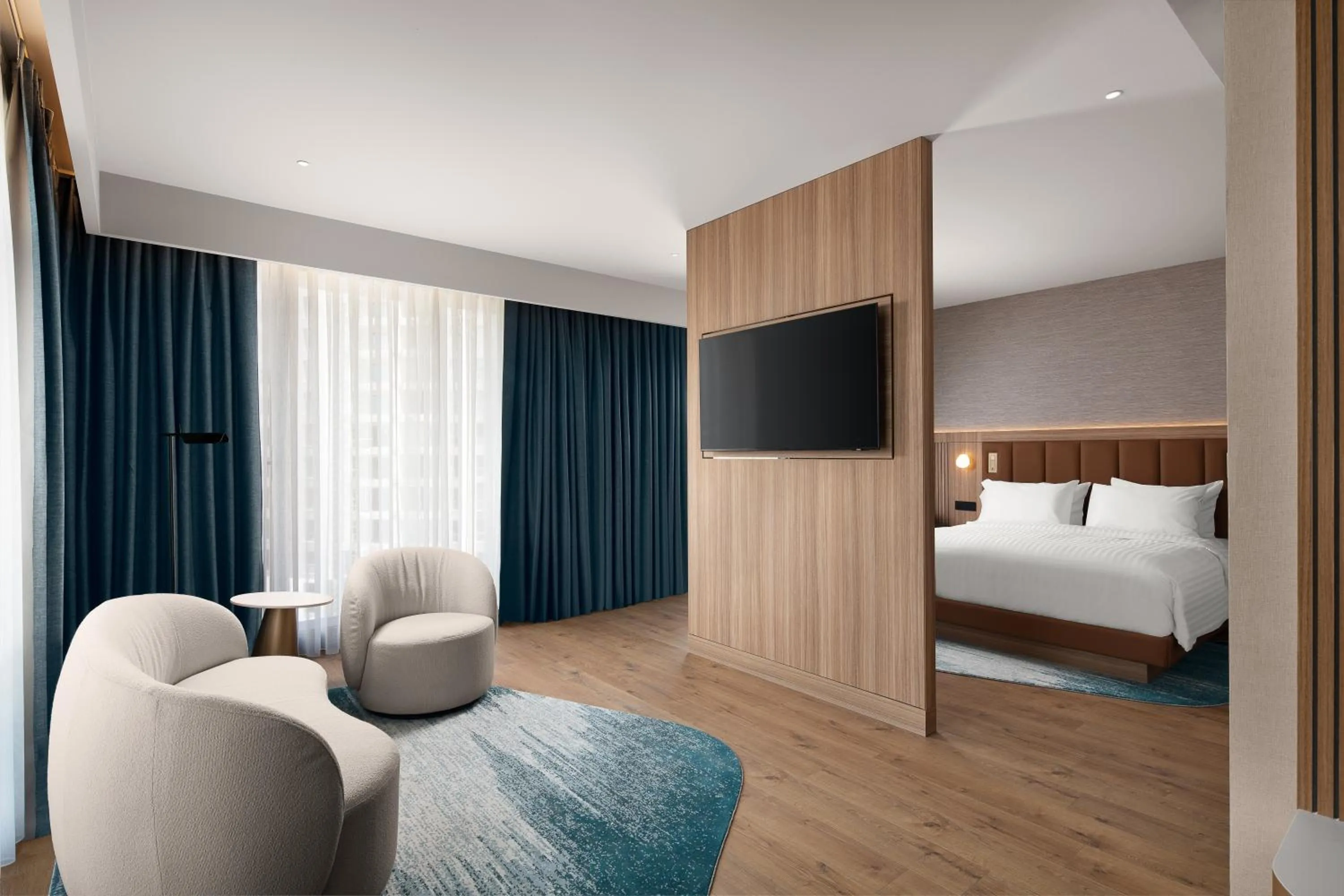 Living room, Bed in Courtyard by Marriott Prishtina