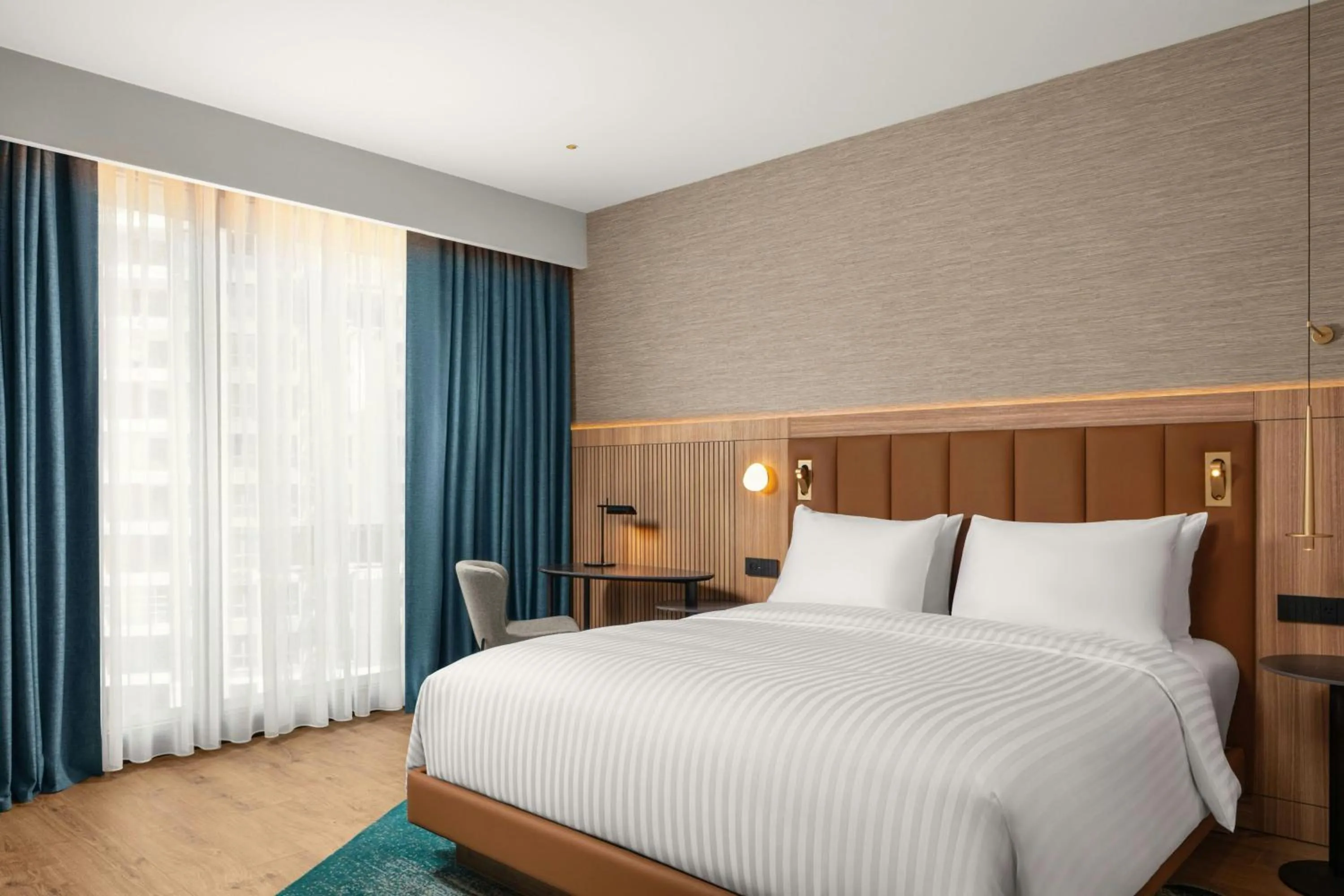 Photo of the whole room, Bed in Courtyard by Marriott Prishtina