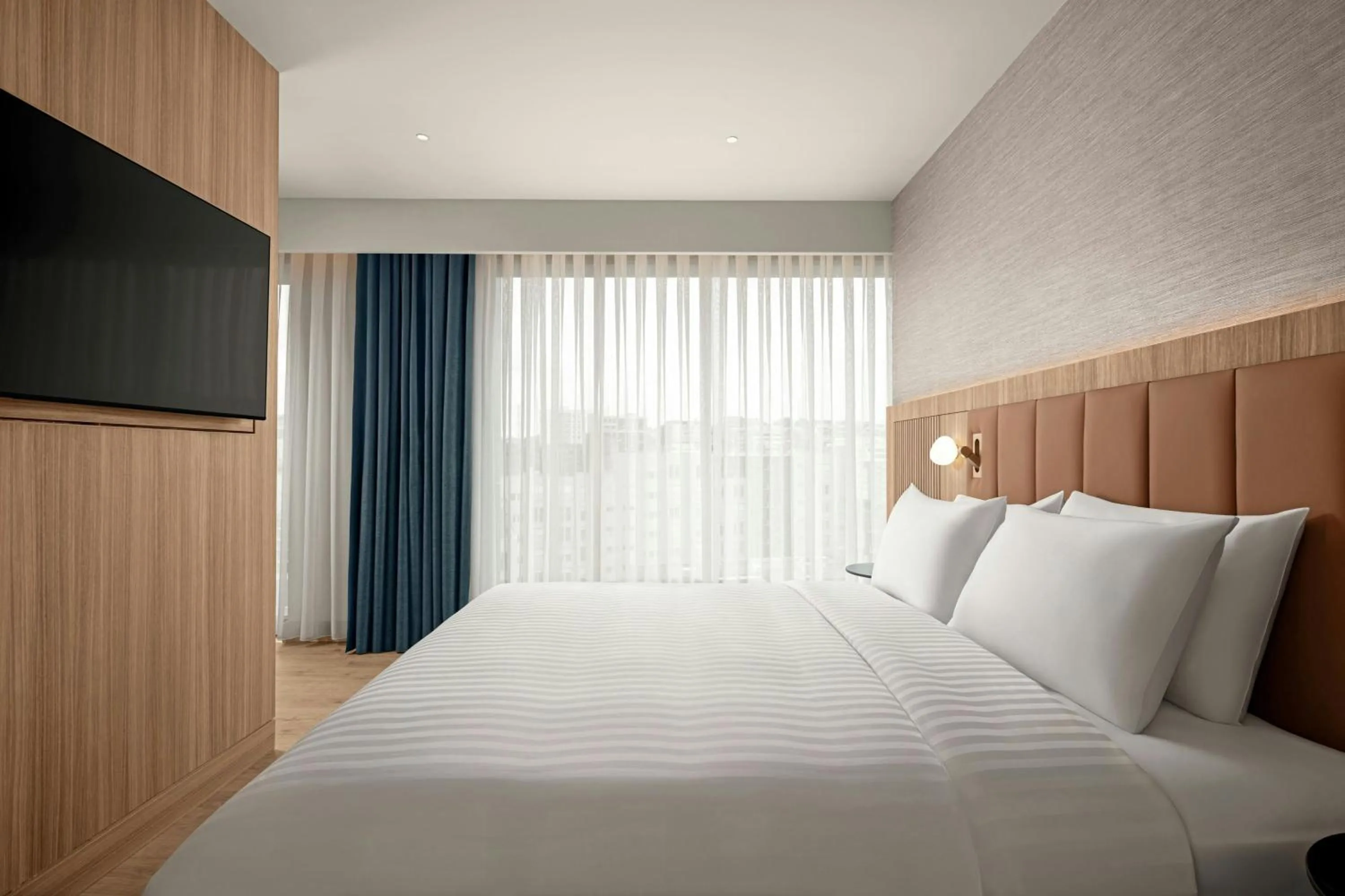 Photo of the whole room, Bed in Courtyard by Marriott Prishtina