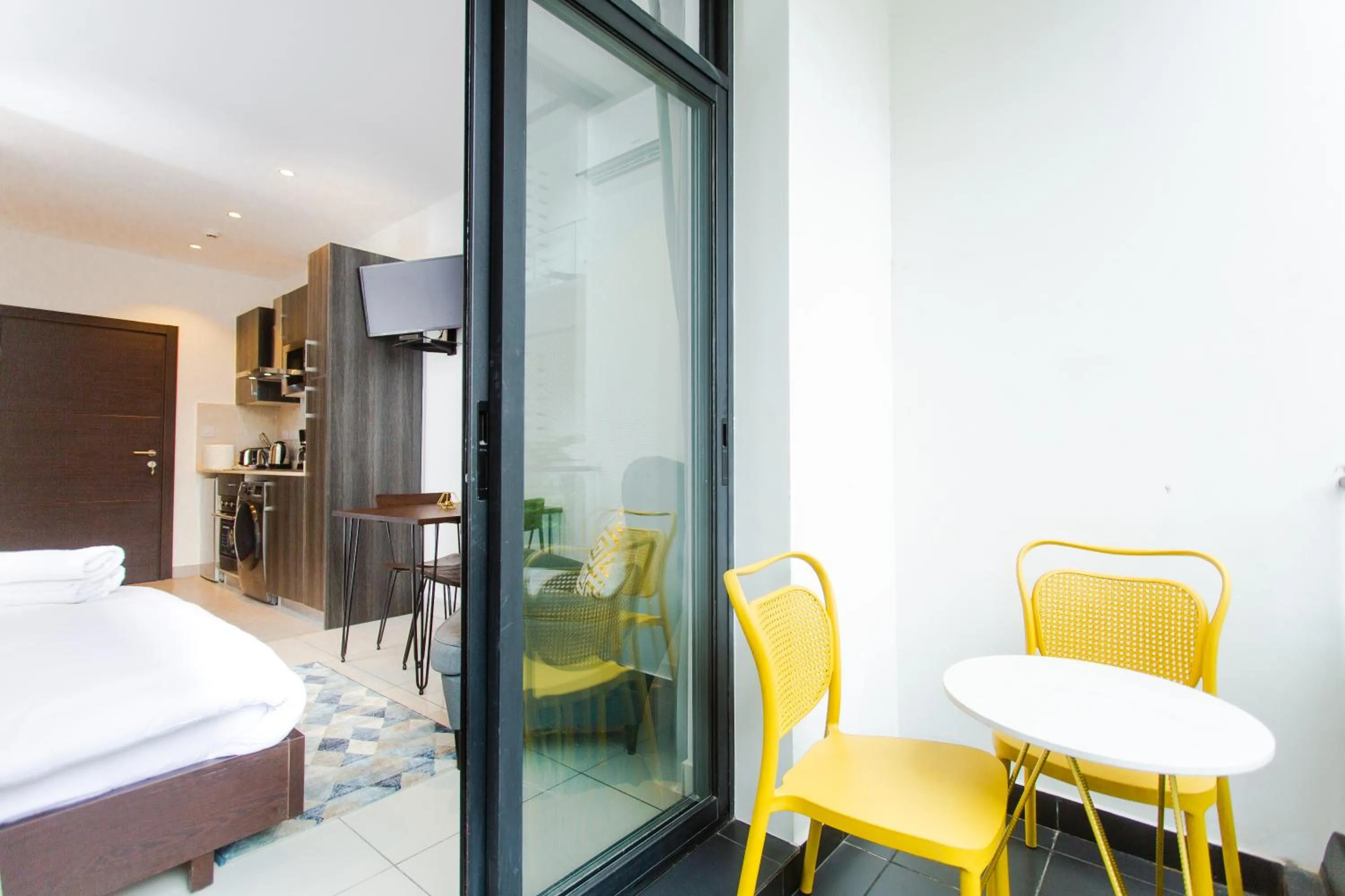 Balcony/Terrace, Bed in Accra Luxury Apartments at Embassy Gardens