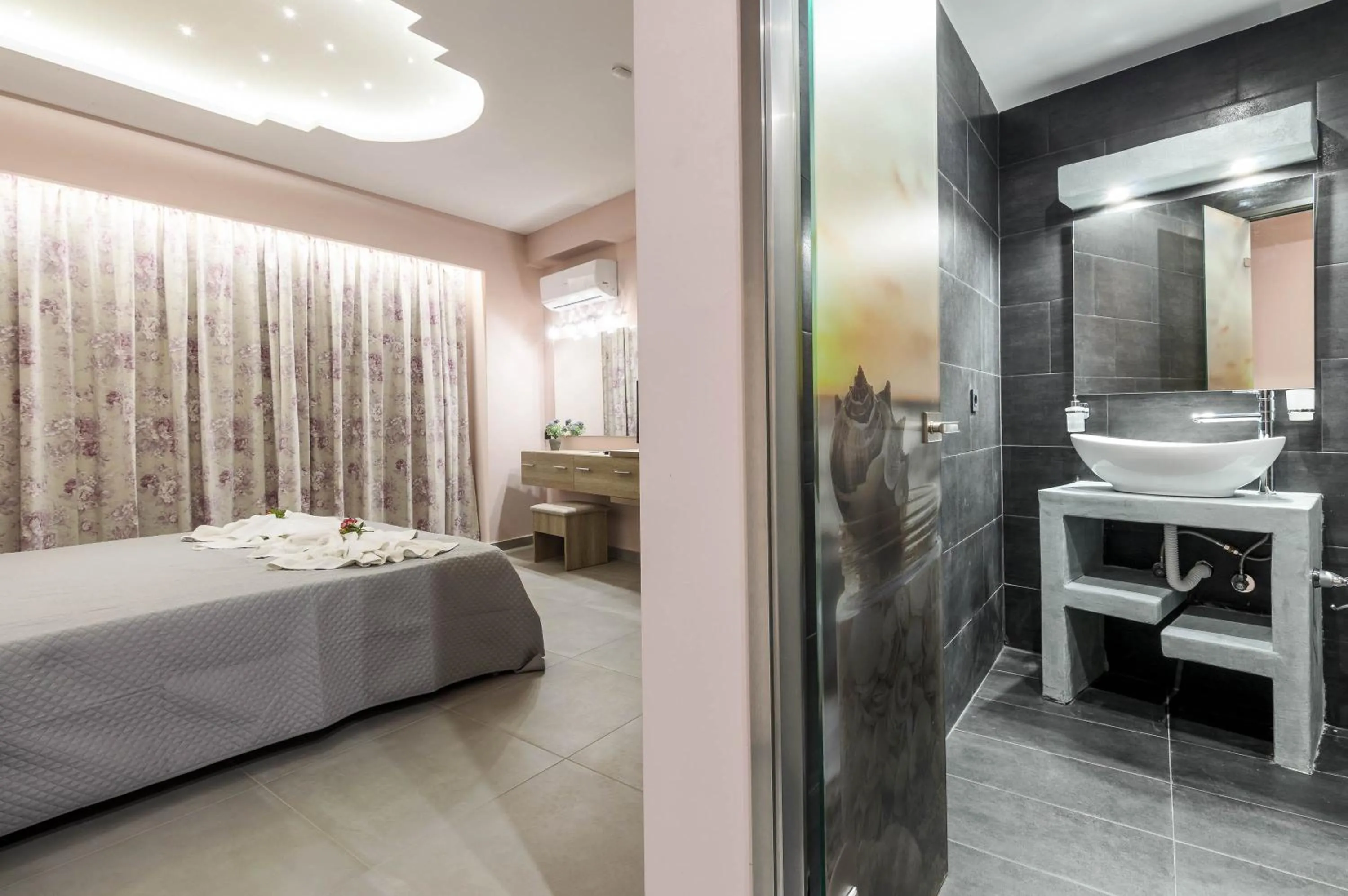 Bed in Artemis Apartments