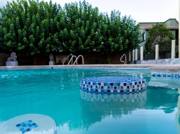 Swimming pool in Hotel Suites El Paseo
