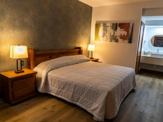 Bed in Hotel Suites El Paseo