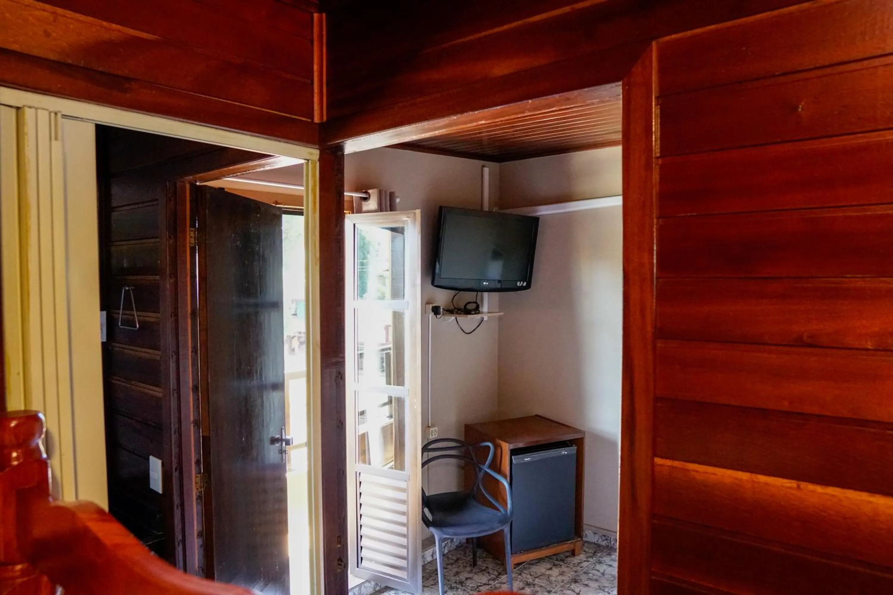 TV and multimedia in Pousada Amanhecer do Itaguá