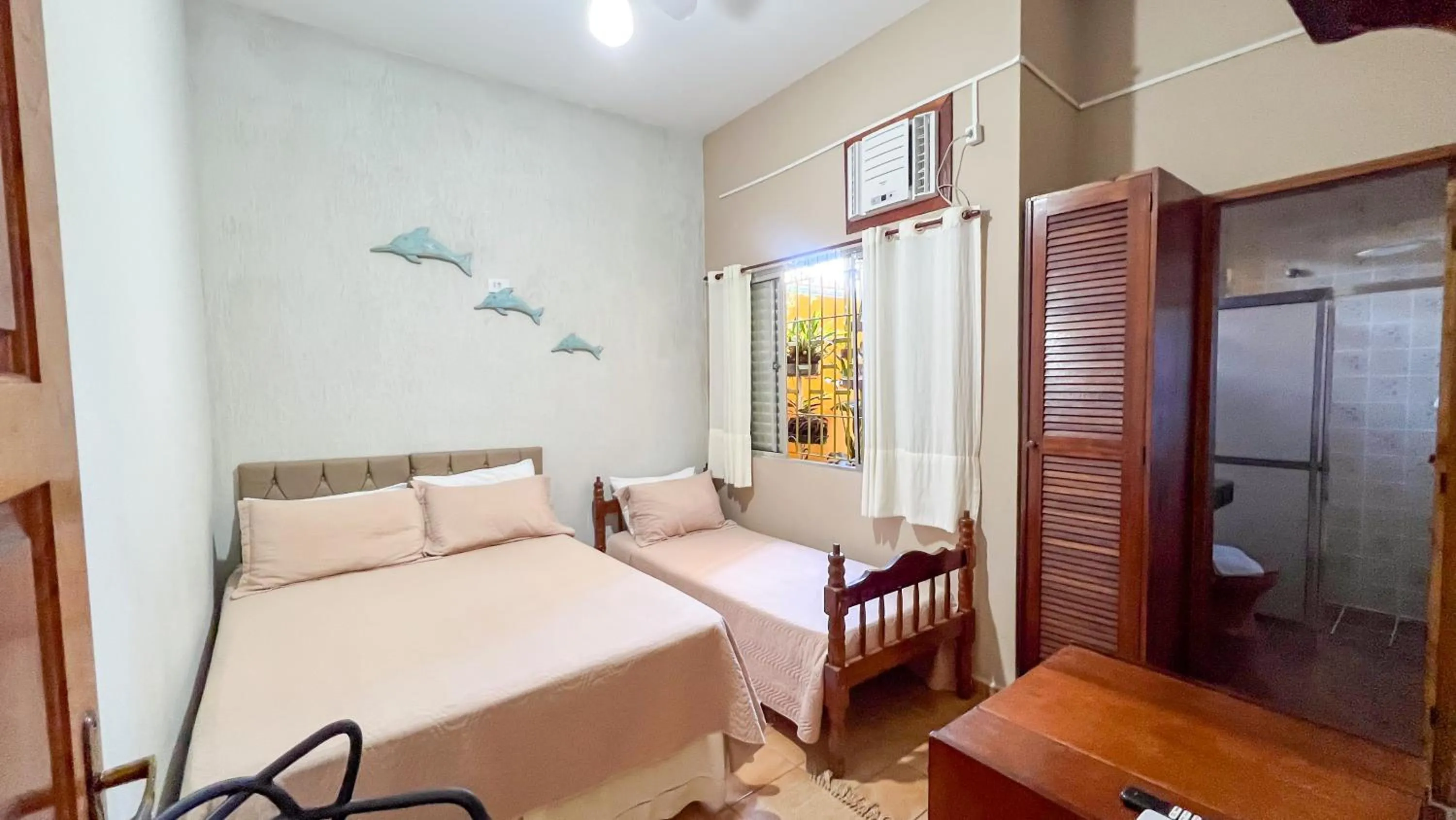 Bed in Pousada Amanhecer do Itaguá