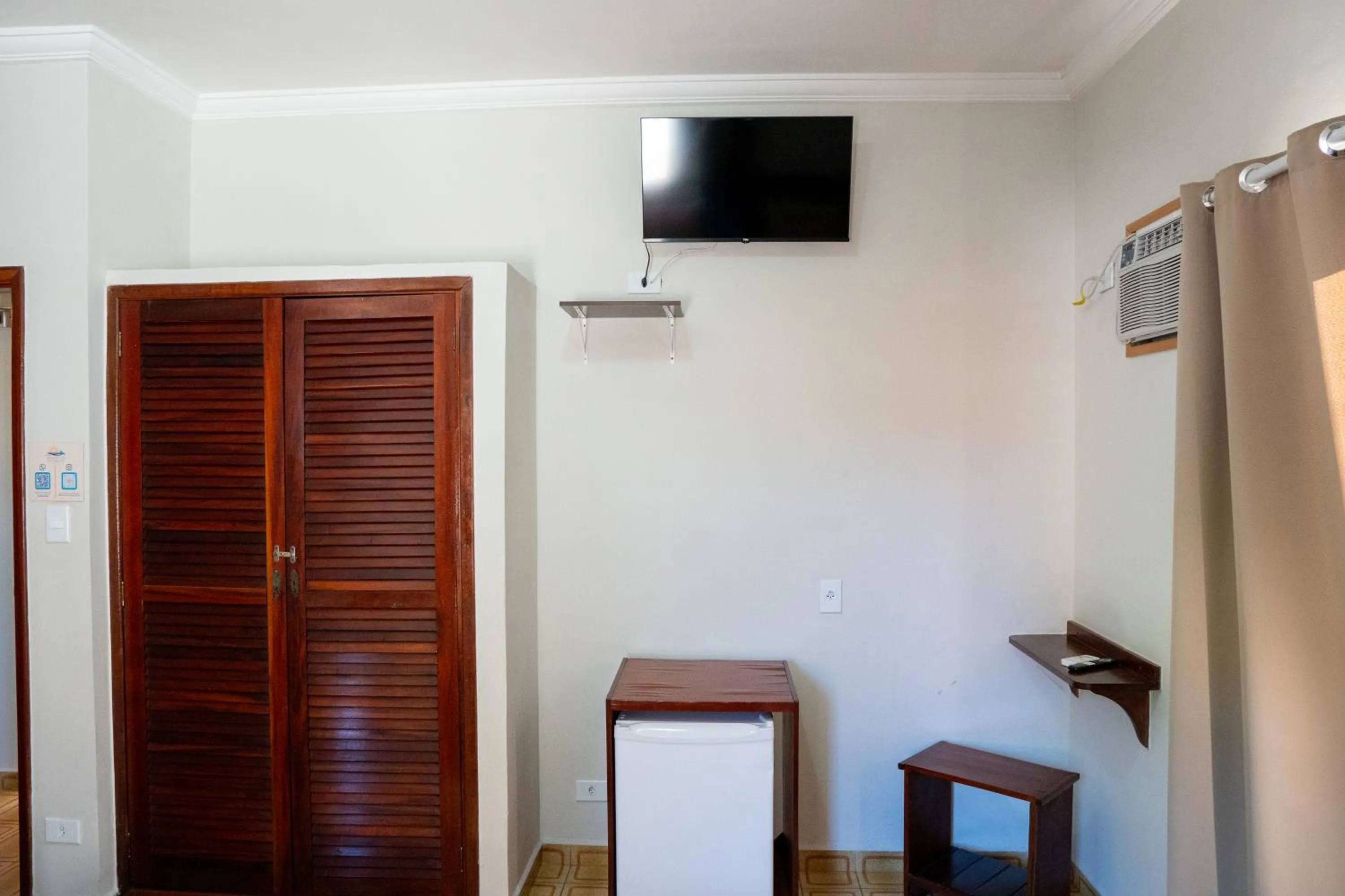 TV and multimedia in Pousada Amanhecer do Itaguá