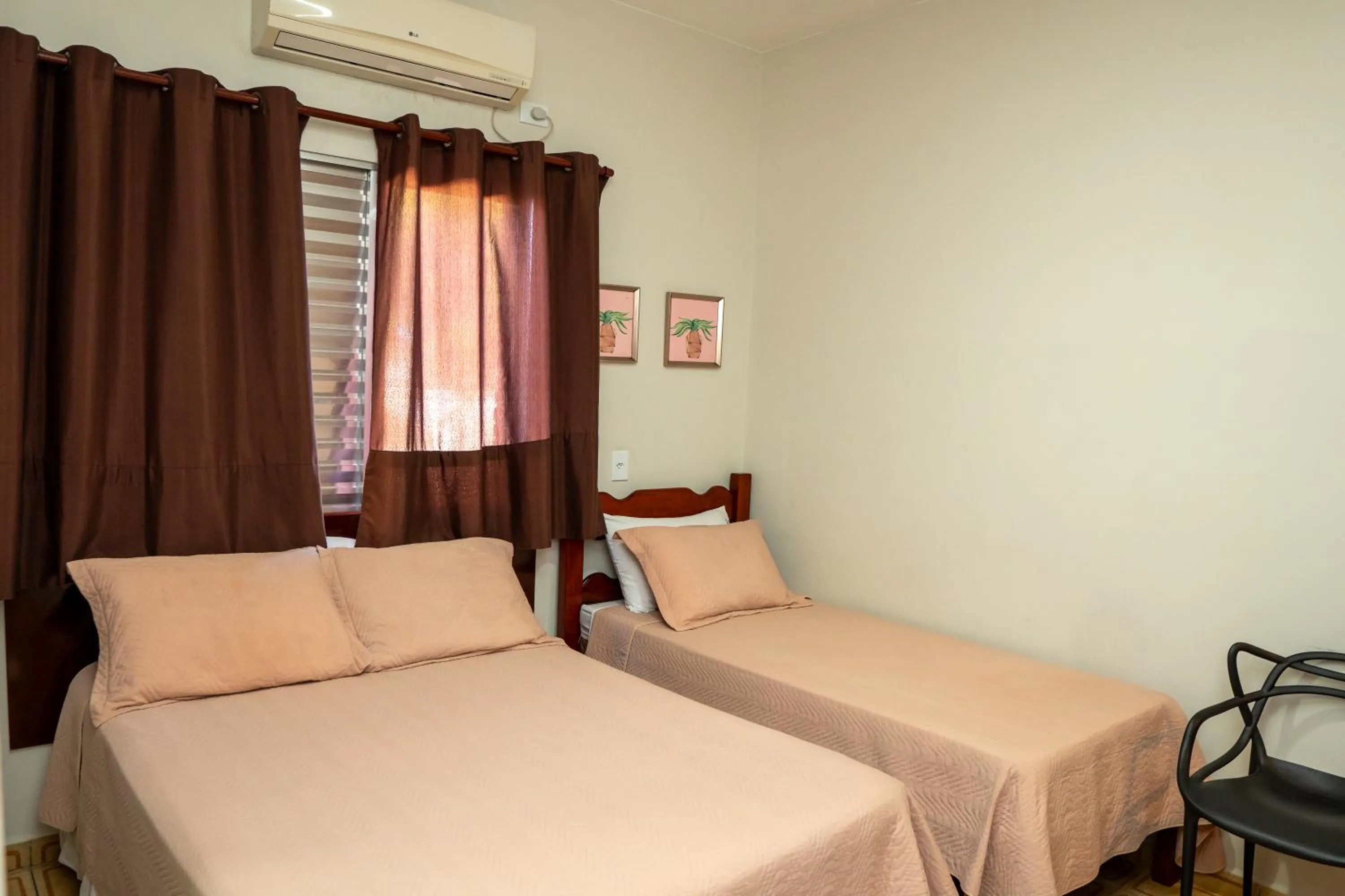 Bed in Pousada Amanhecer do Itaguá