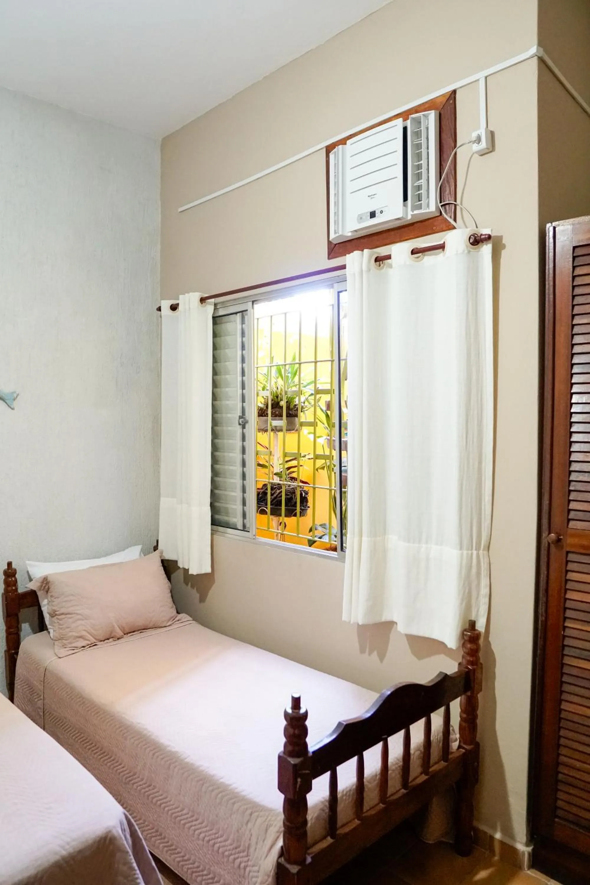 Bed in Pousada Amanhecer do Itaguá