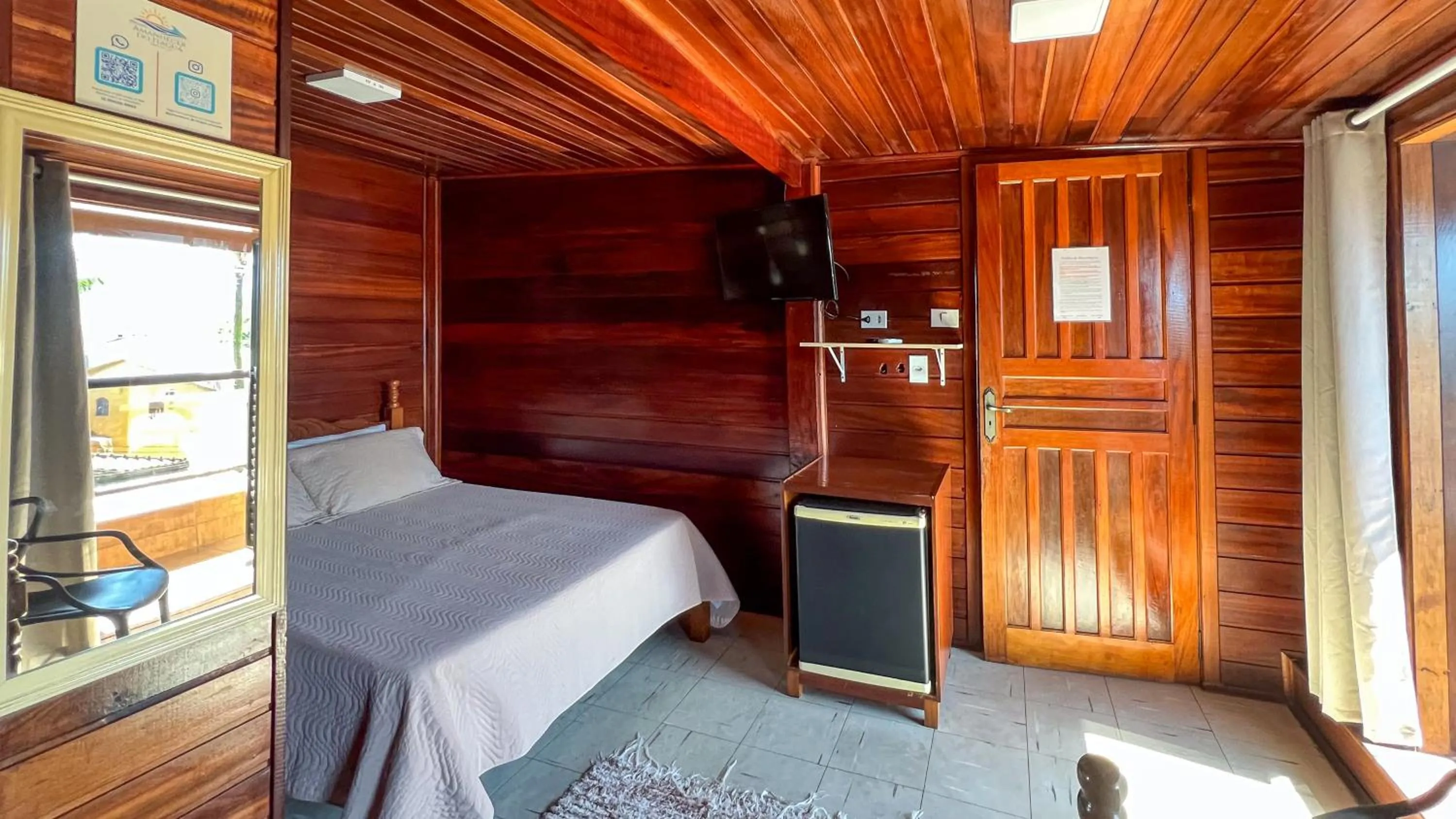 TV and multimedia in Pousada Amanhecer do Itaguá