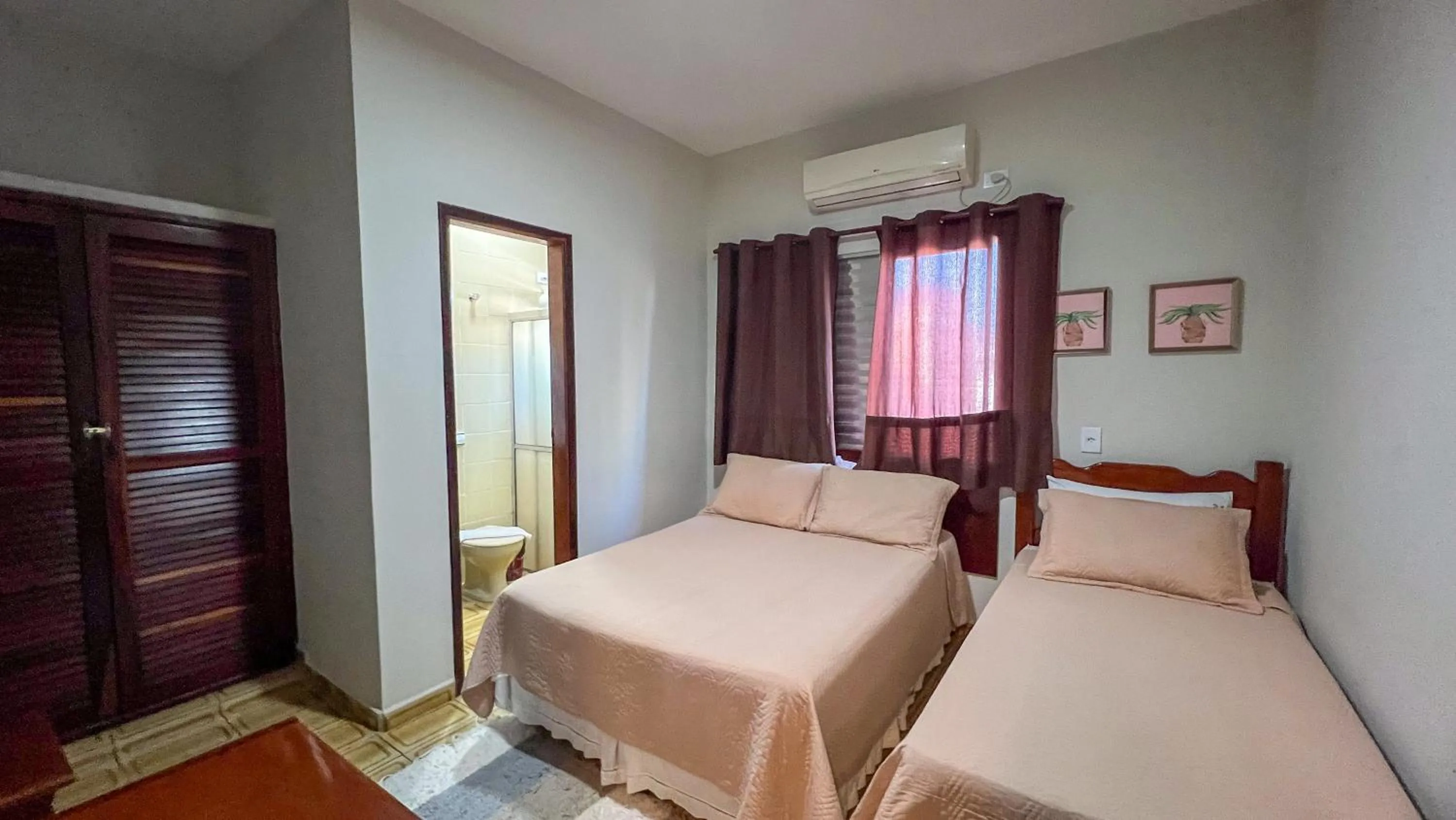 Bed in Pousada Amanhecer do Itaguá