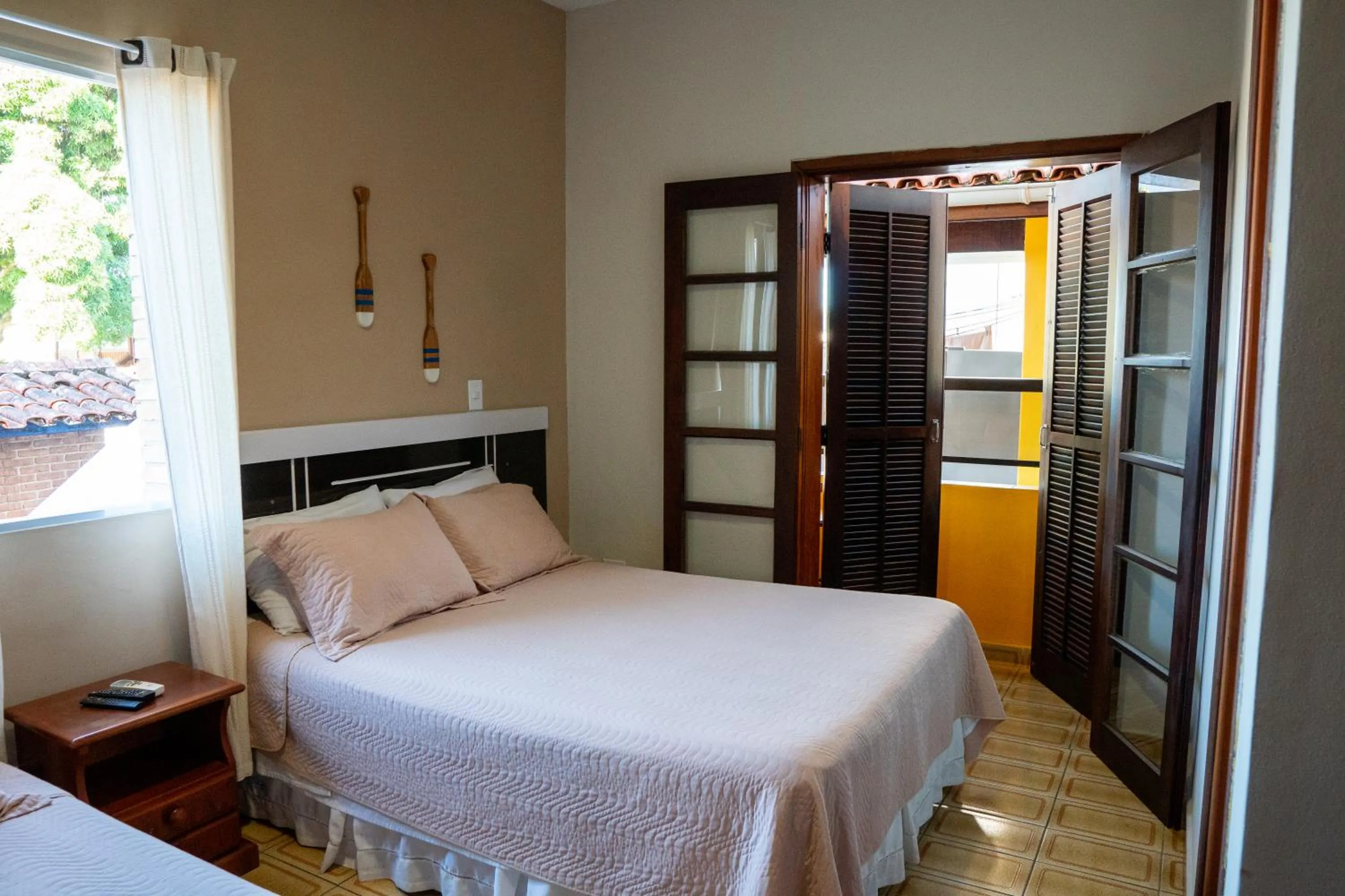 Bed in Pousada Amanhecer do Itaguá