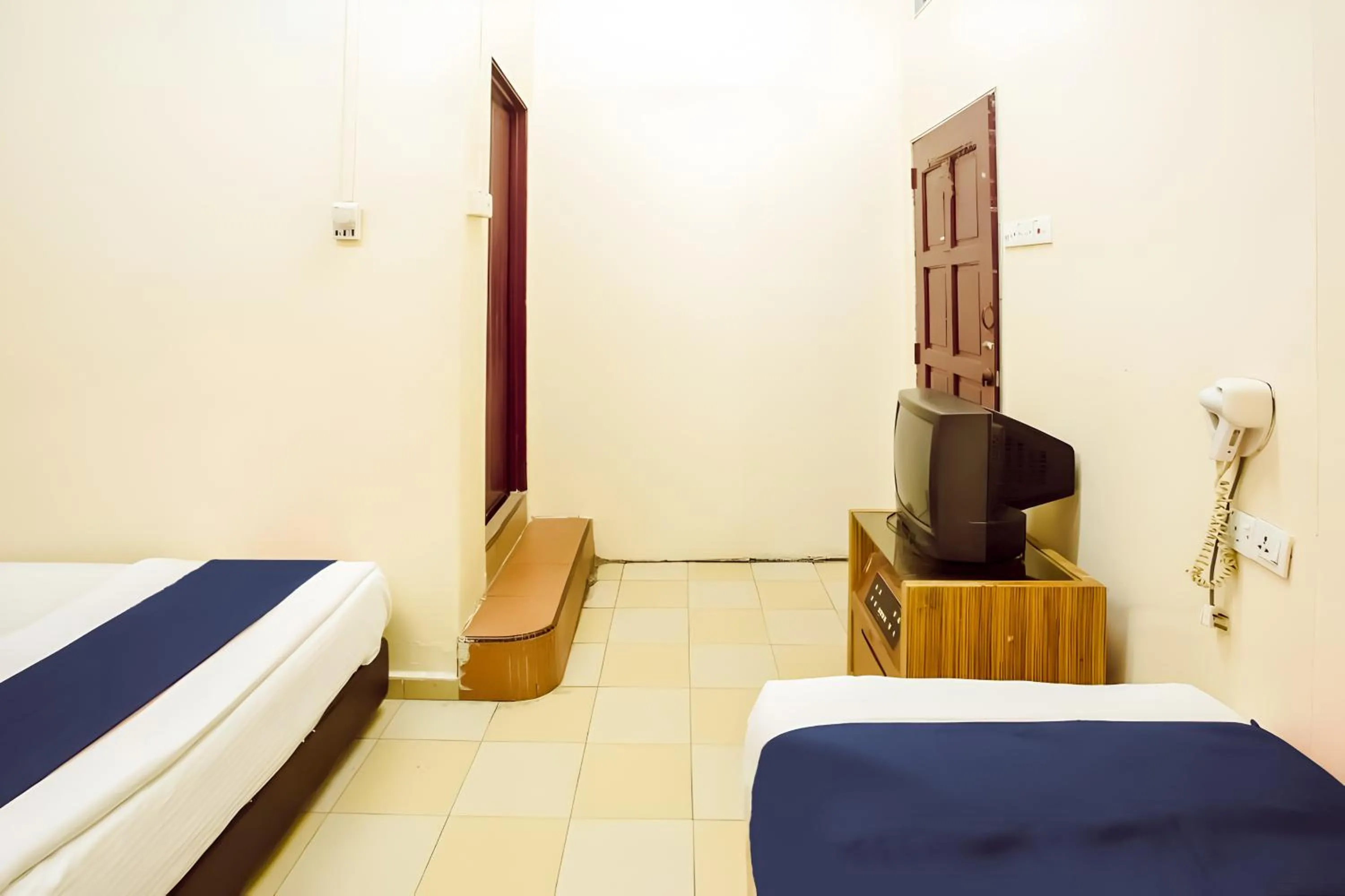 Bed in New Casavilla Travellers Lodge Pudu