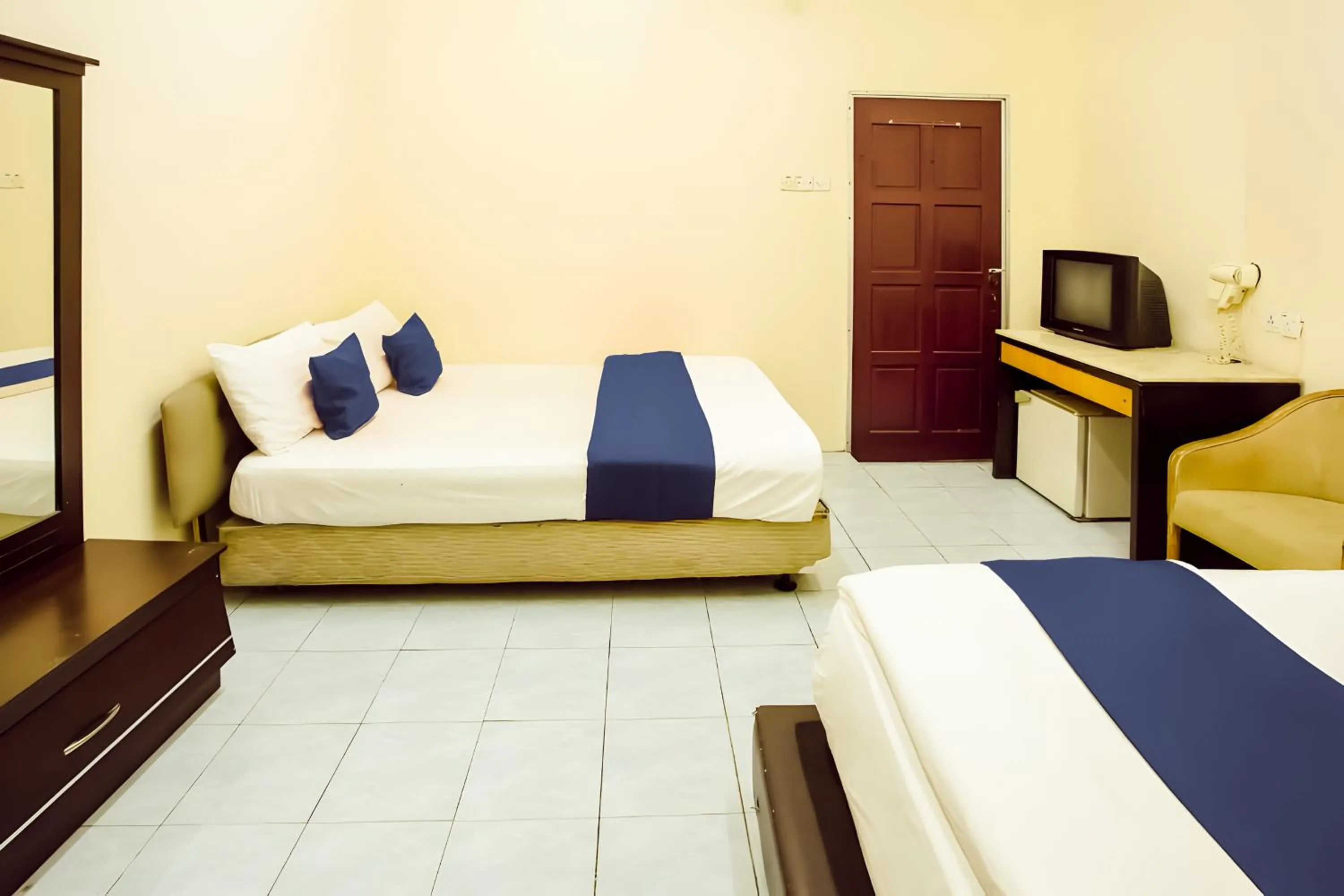 Bed in New Casavilla Travellers Lodge Pudu