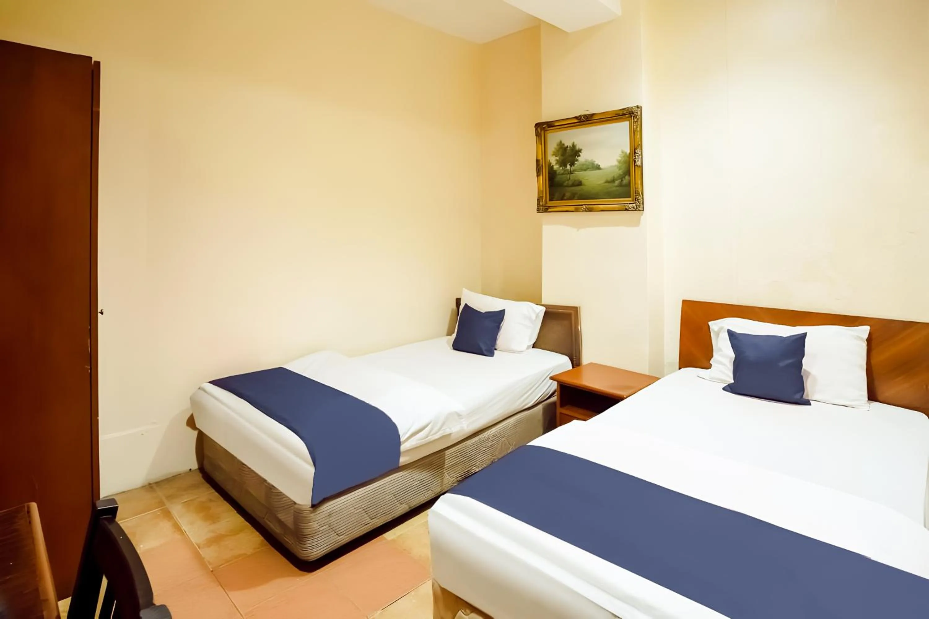 Bed in New Casavilla Travellers Lodge Pudu