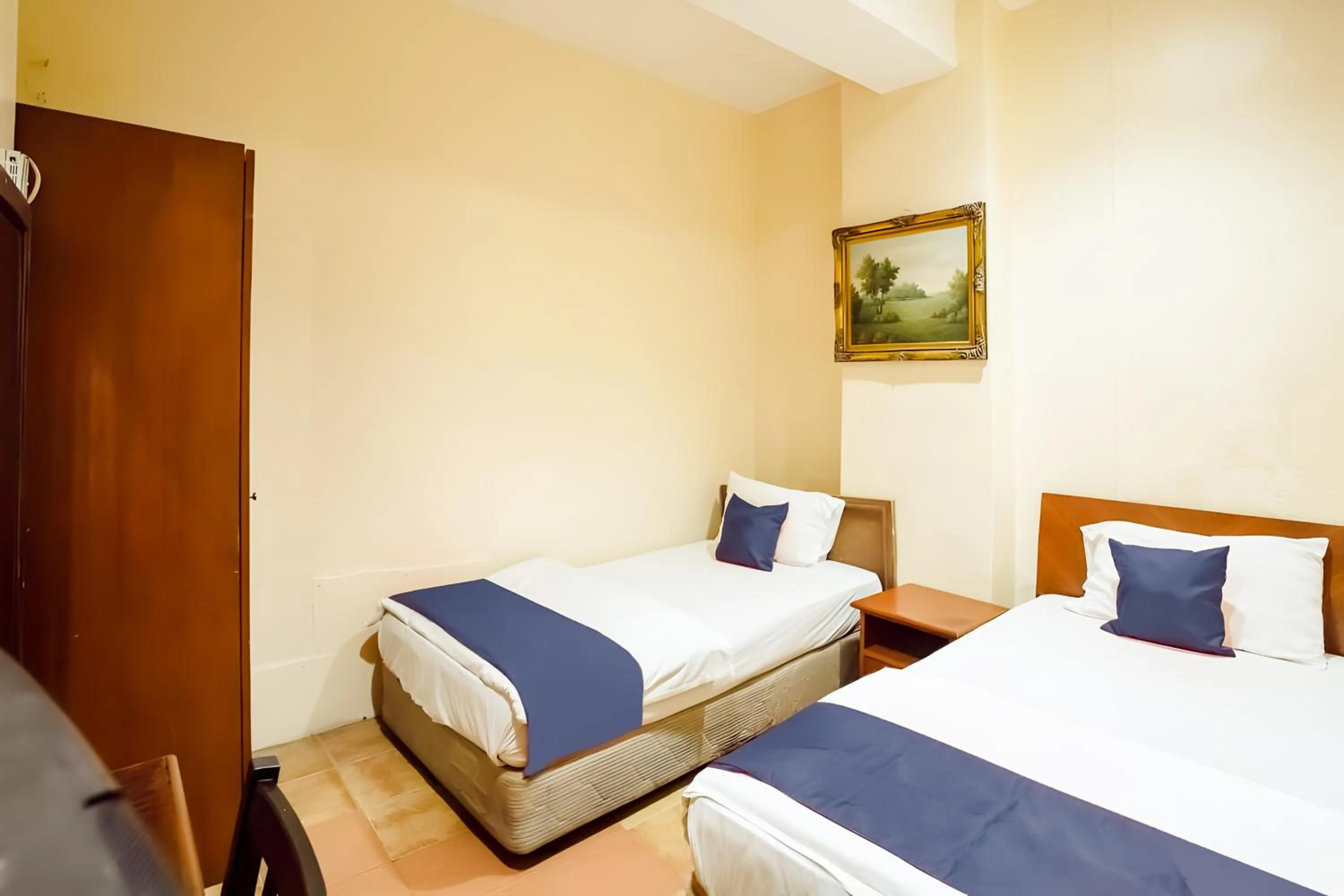 Bed in New Casavilla Travellers Lodge Pudu