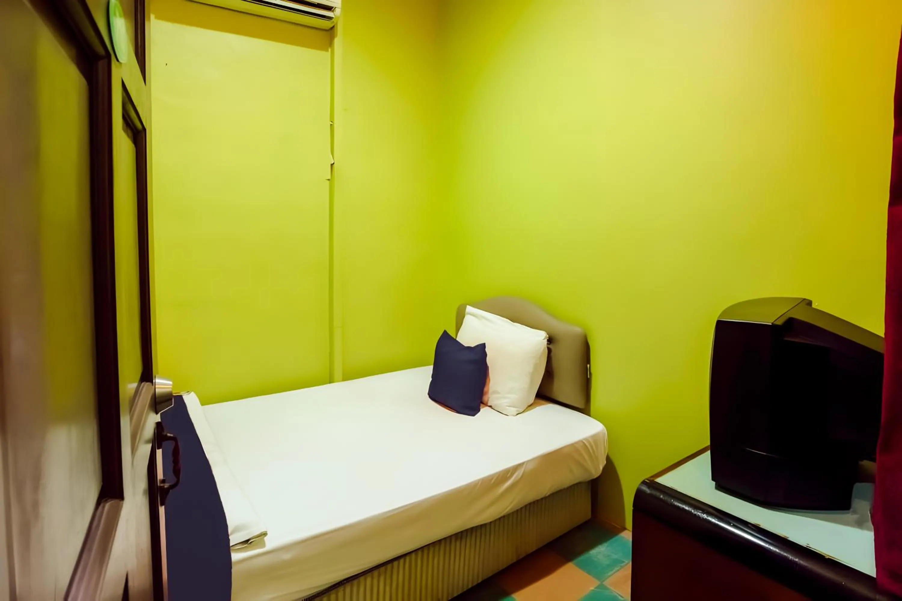 Bed in New Casavilla Travellers Lodge Pudu