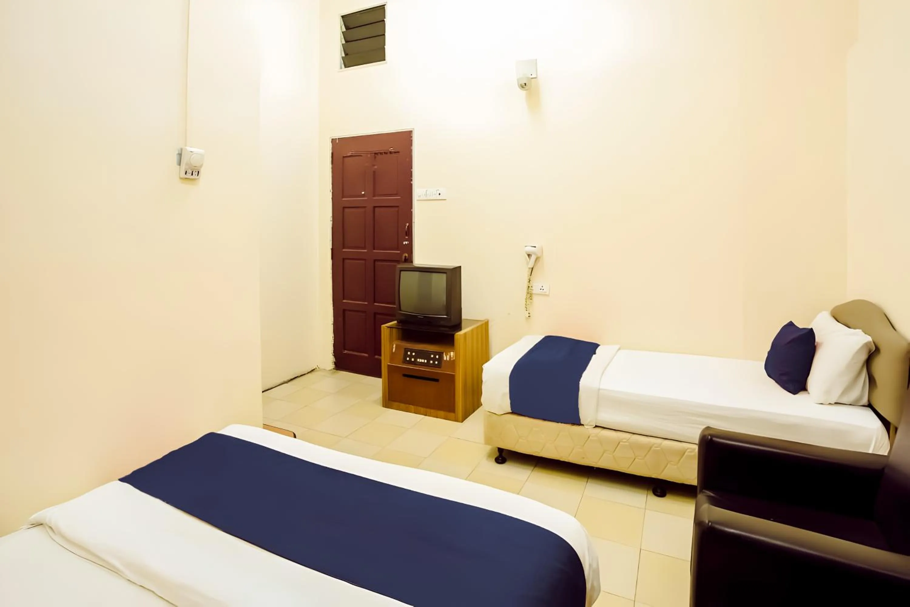 Bed in New Casavilla Travellers Lodge Pudu