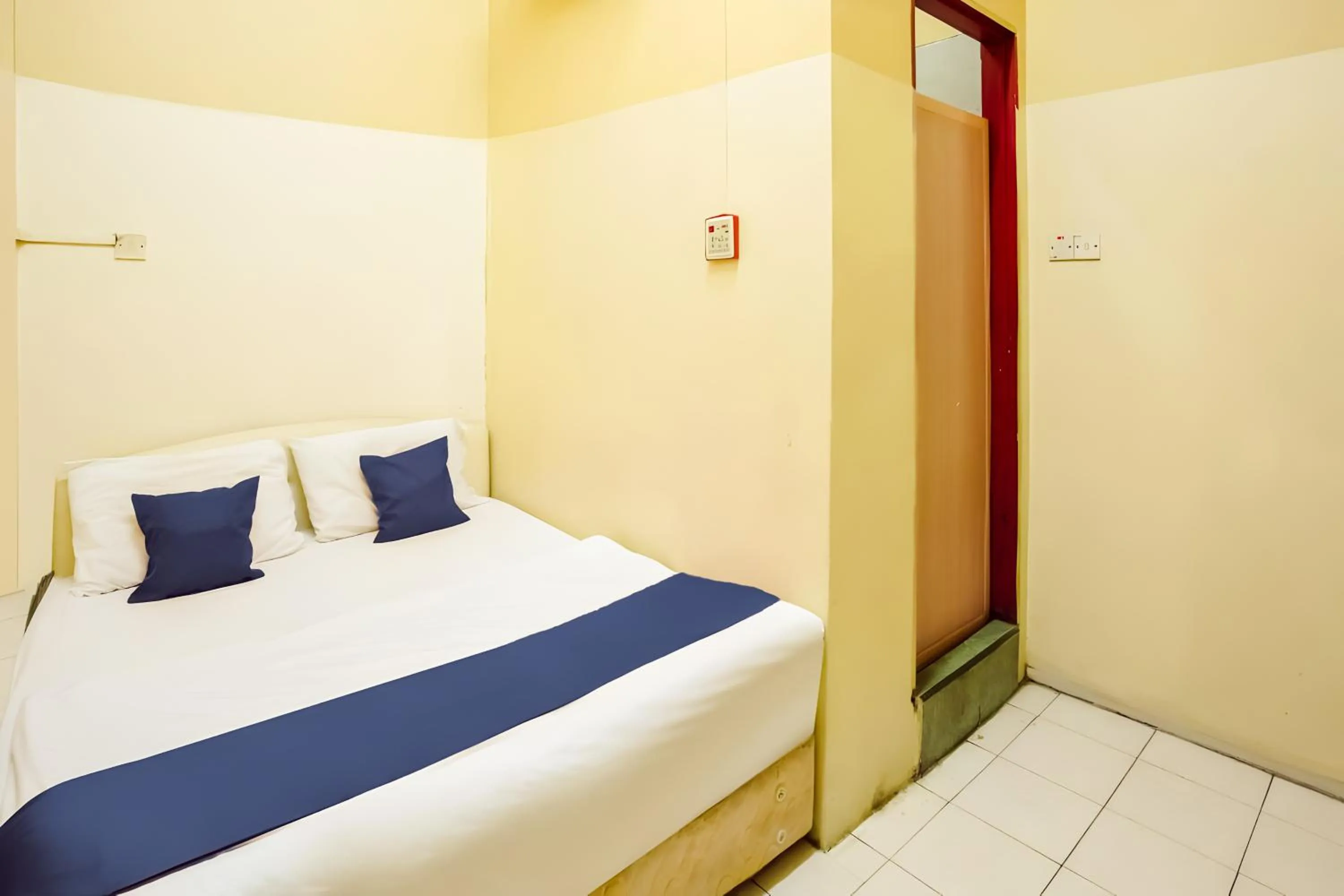 Bed in New Casavilla Travellers Lodge Pudu