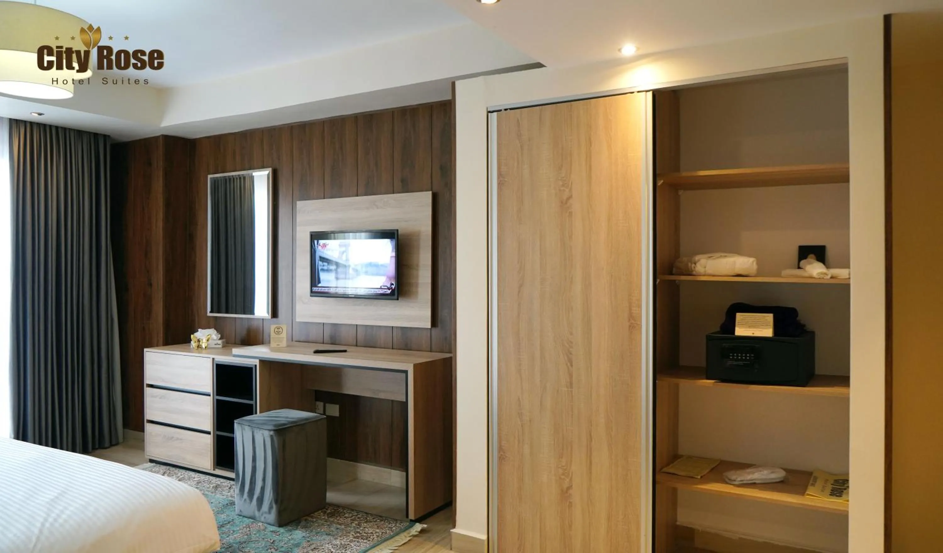 Bed in City Rose Hotel Suites