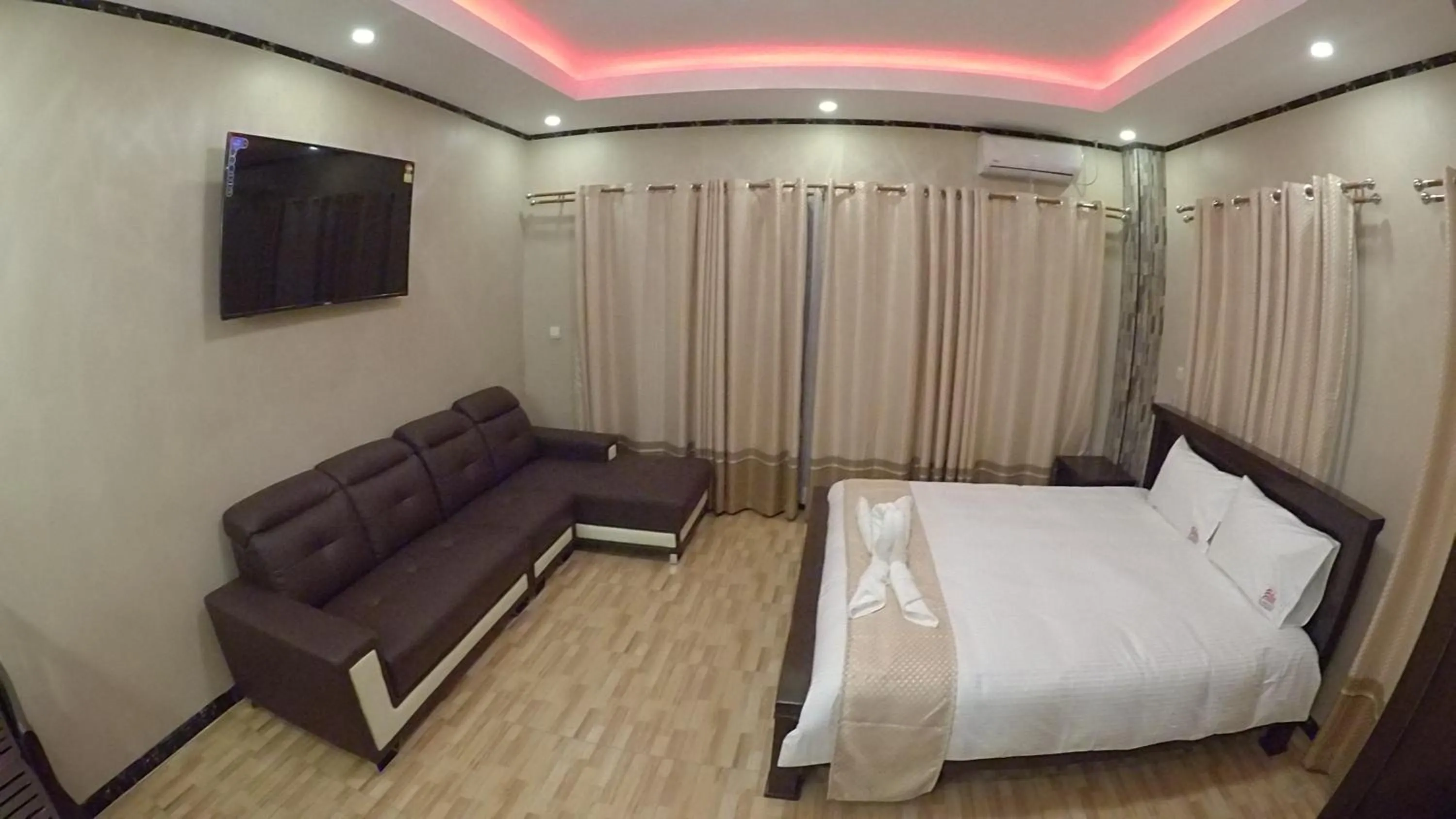 Bed in Al - Minhaj Service Apartments