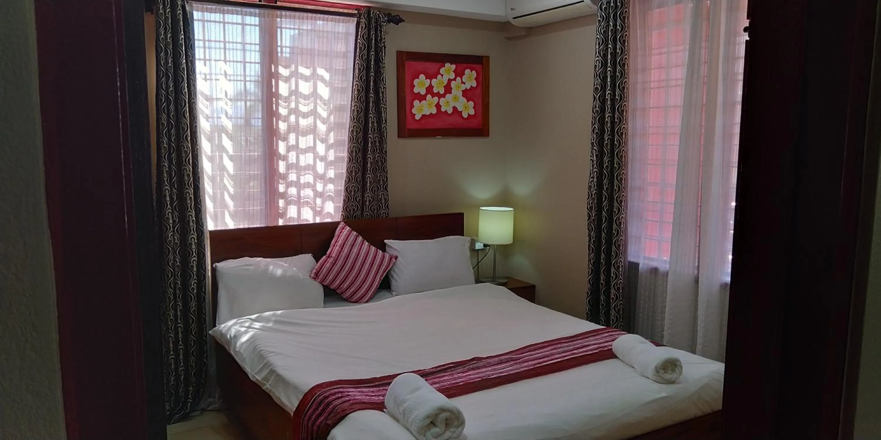 Bed in Al - Minhaj Service Apartments