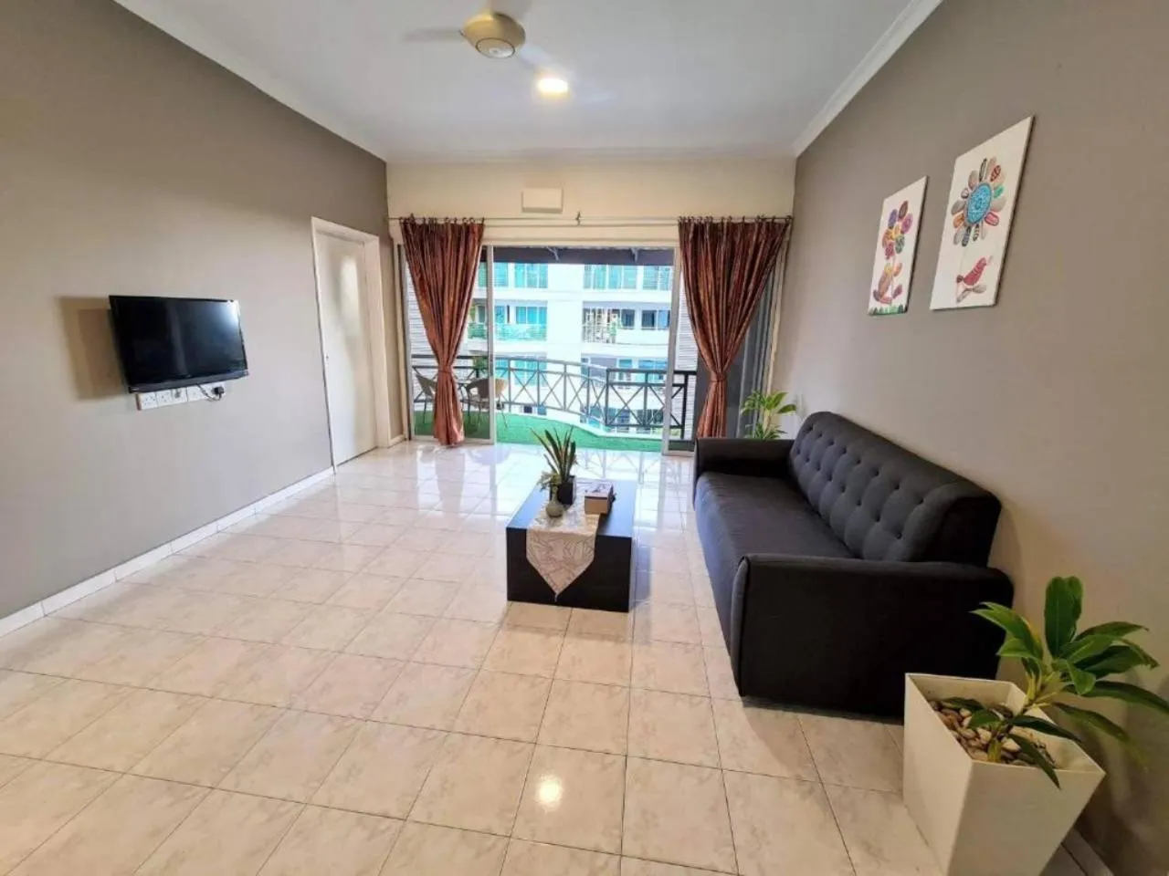 Living room in Perdana Serviced Apartment & Resorts