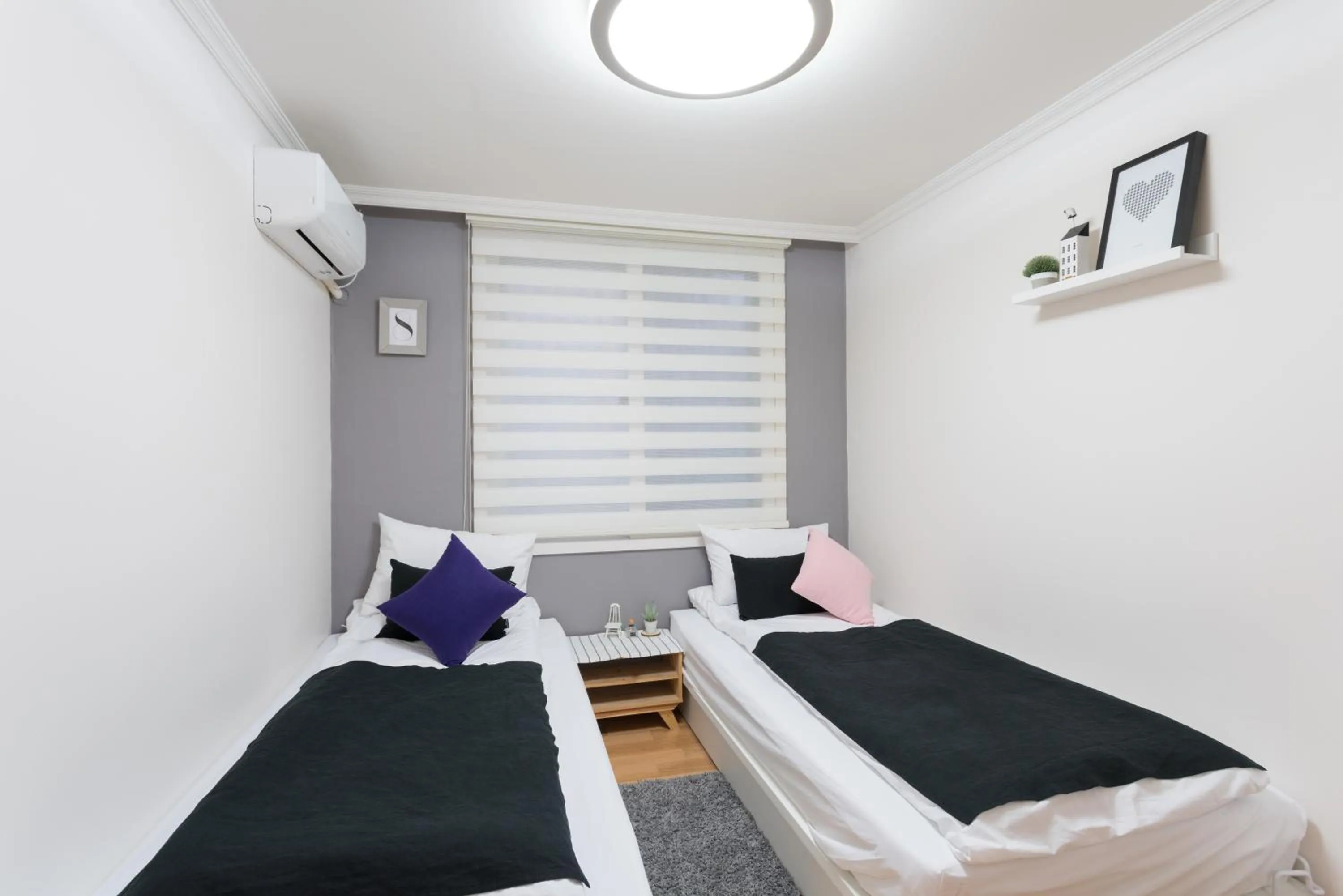 Bed in The Blossom Yeonnam Guesthouse