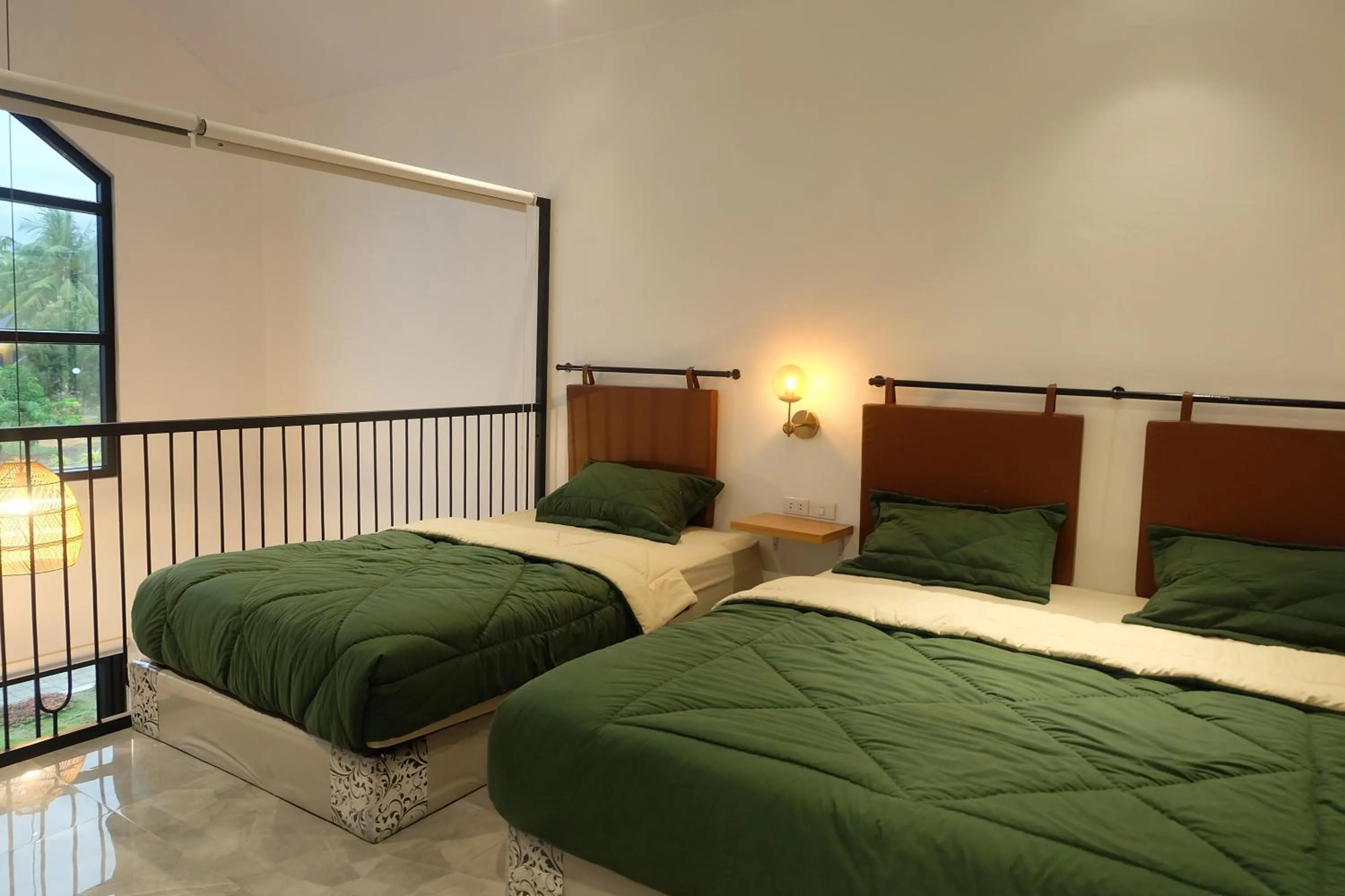 Bed in Sribudaya Resort