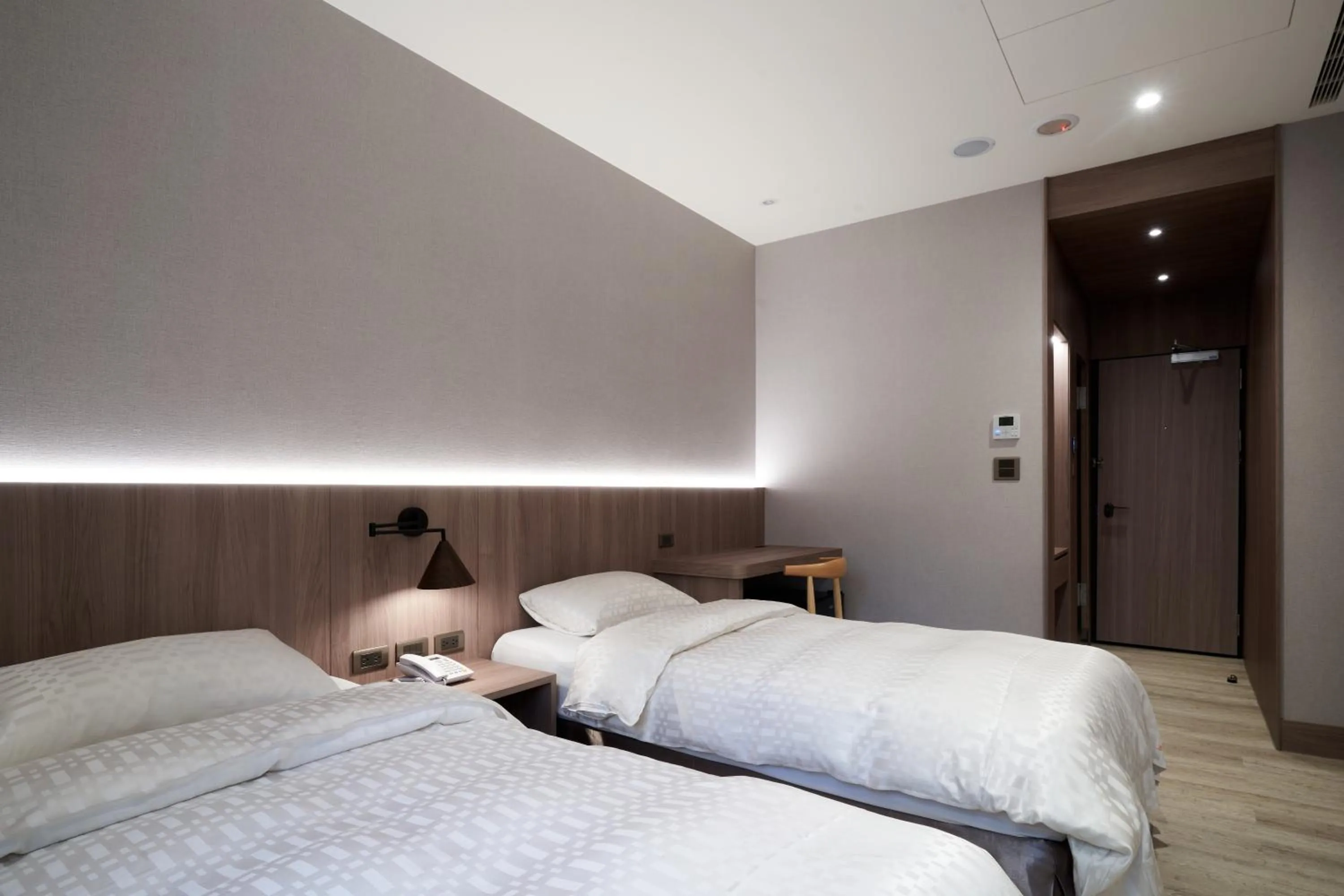 Bed in Yung An Business Hotel