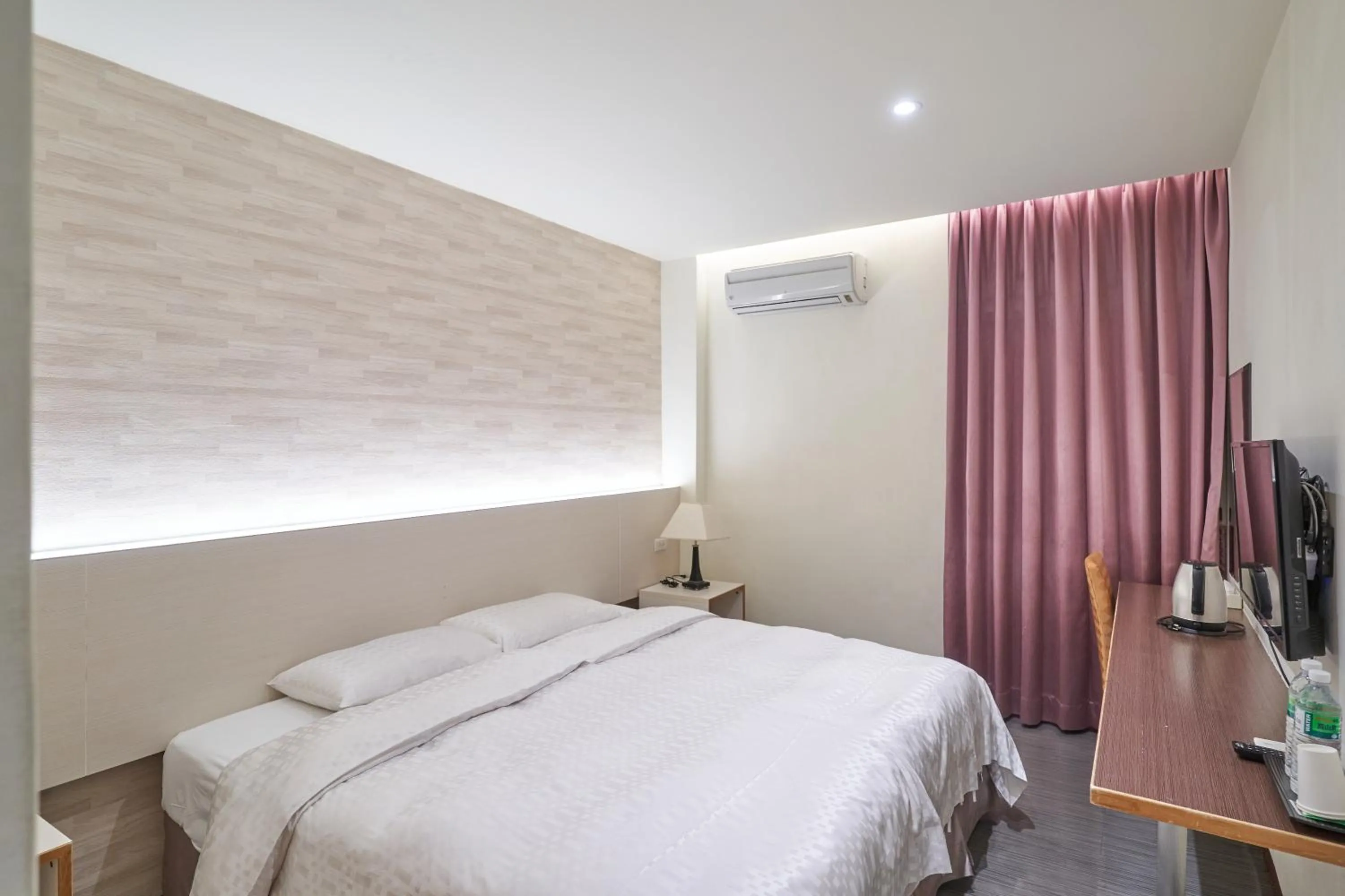 Bed in Yung An Business Hotel