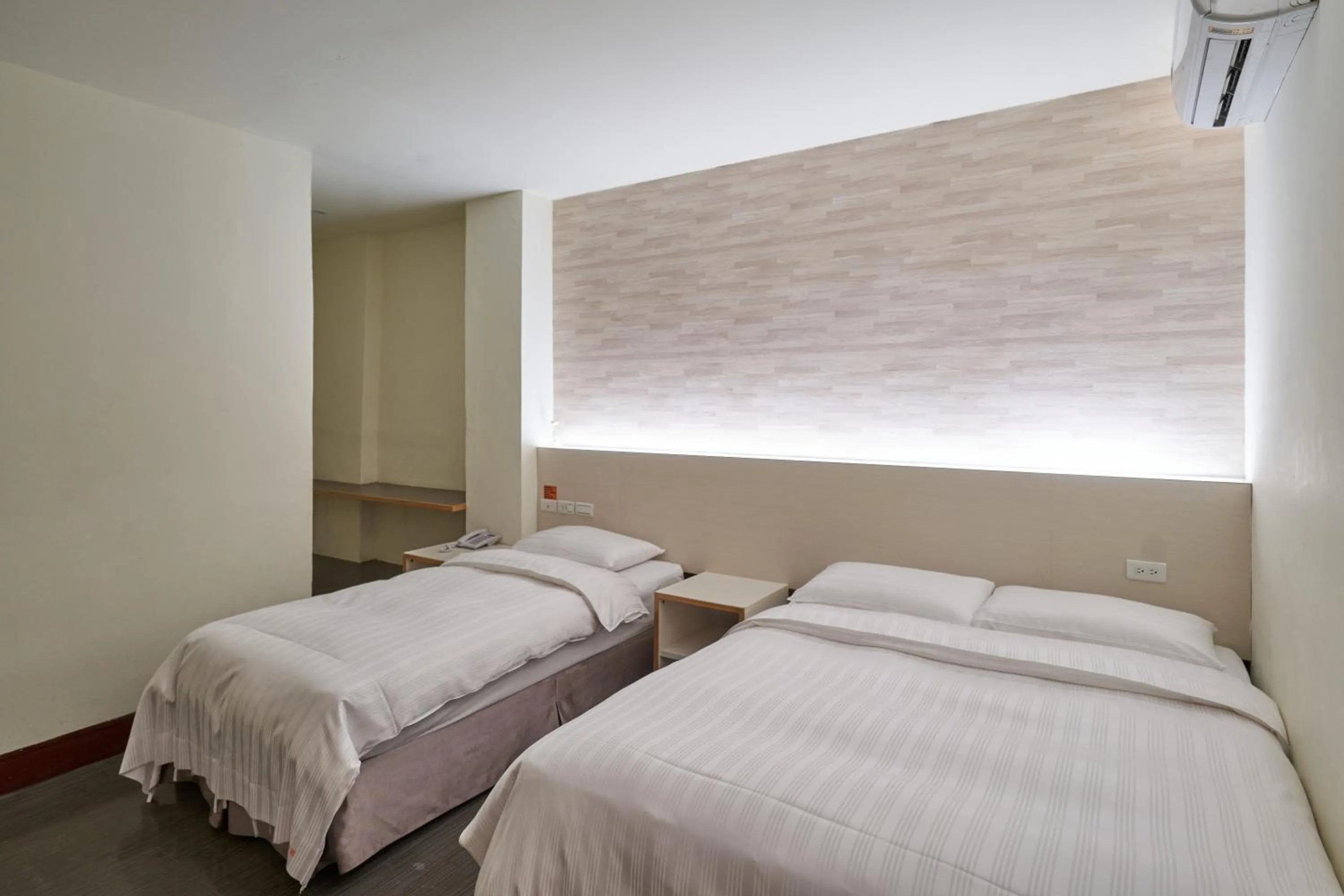 Bed in Yung An Business Hotel