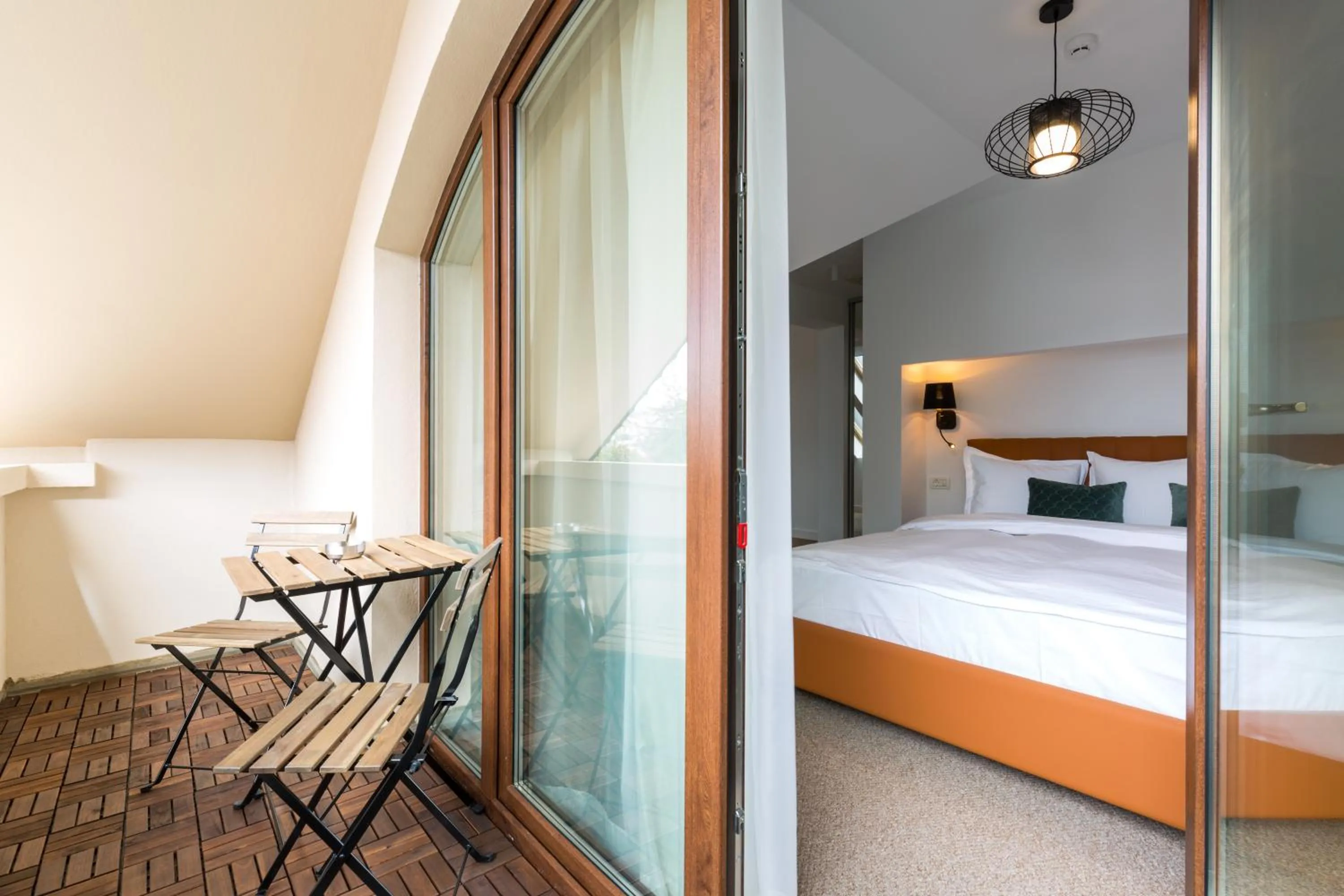 Bed in UpperHouse Suites & More