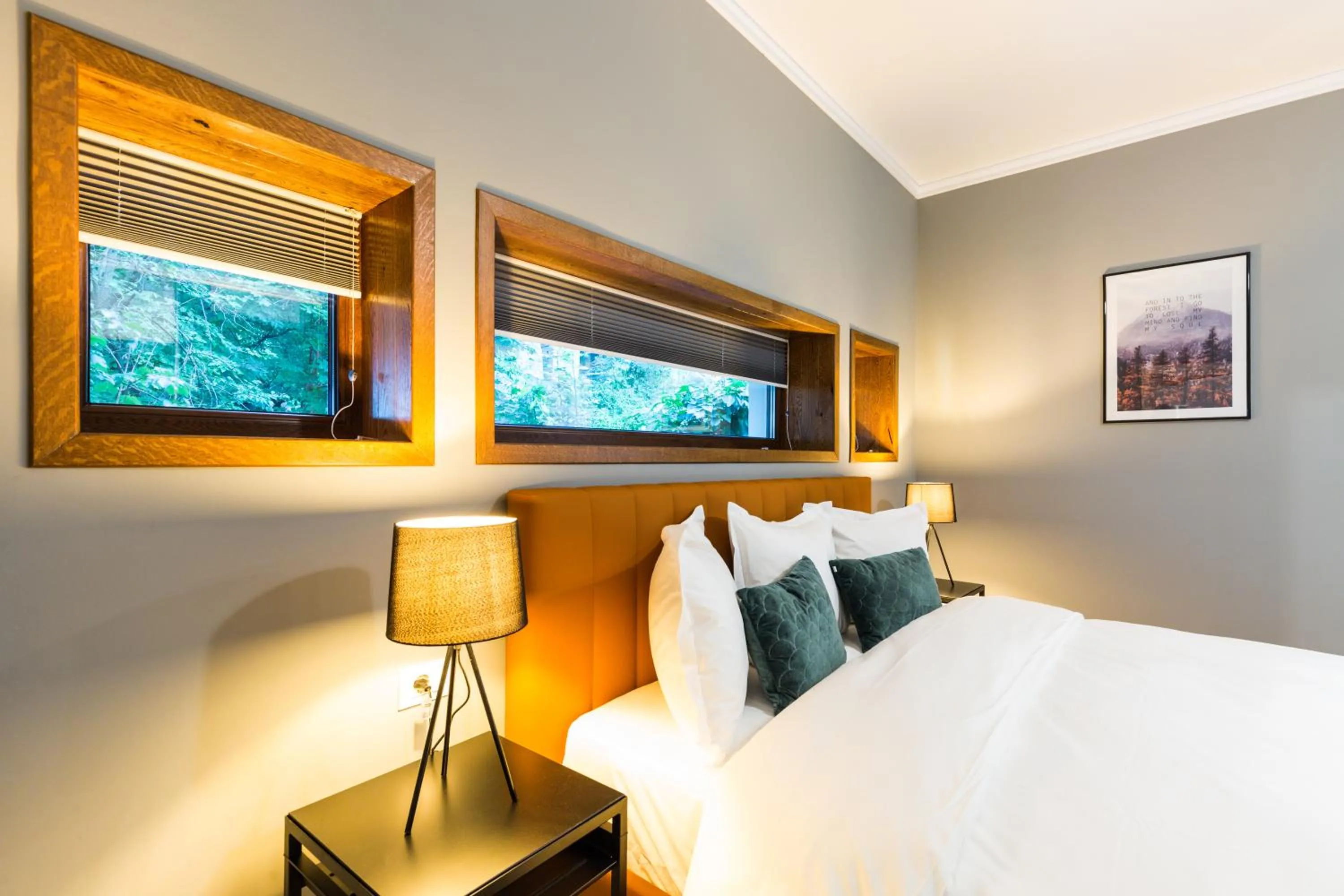 Bed in UpperHouse Suites & More