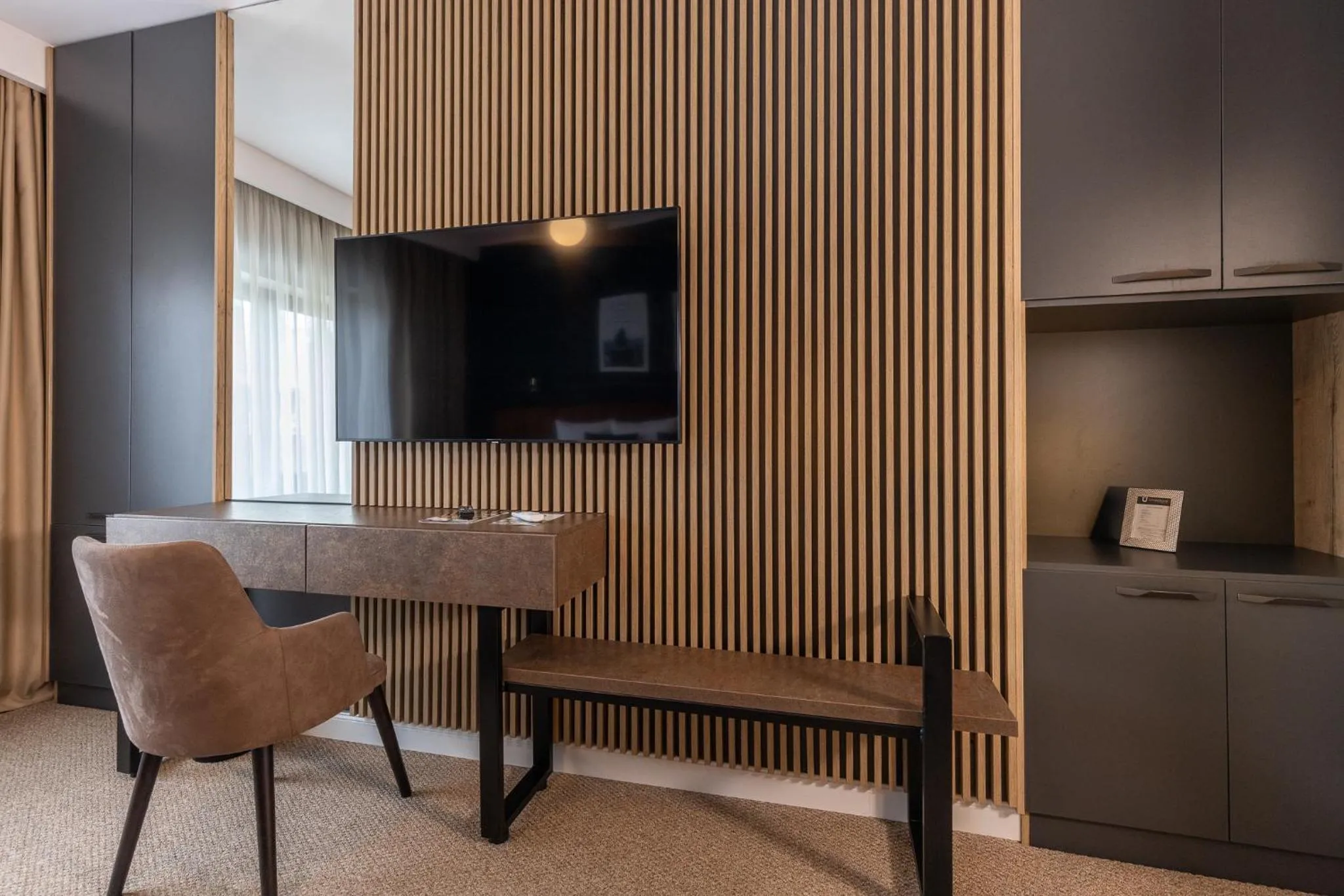 TV and multimedia in UpperHouse Suites & More