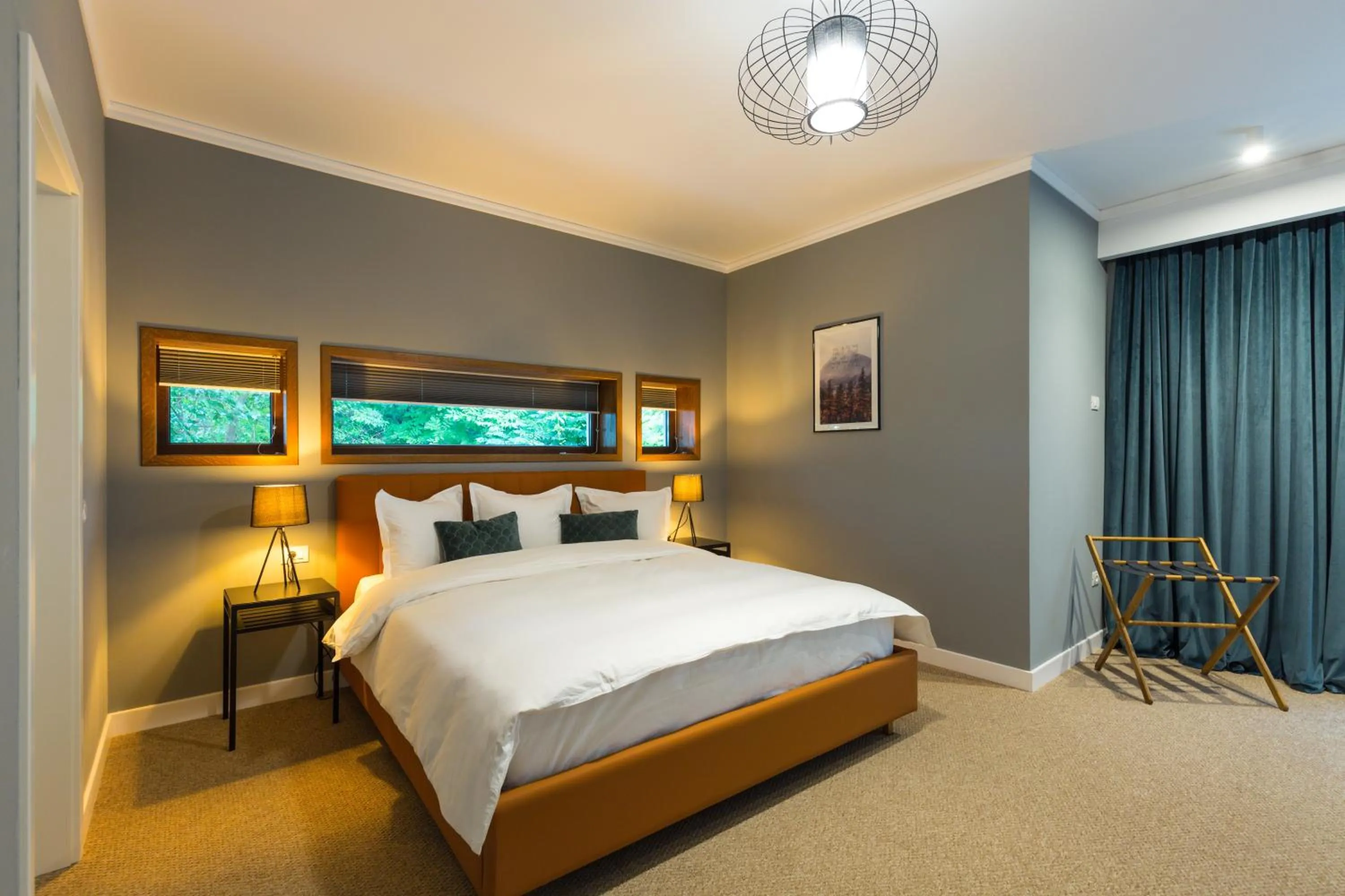 Bed in UpperHouse Suites & More