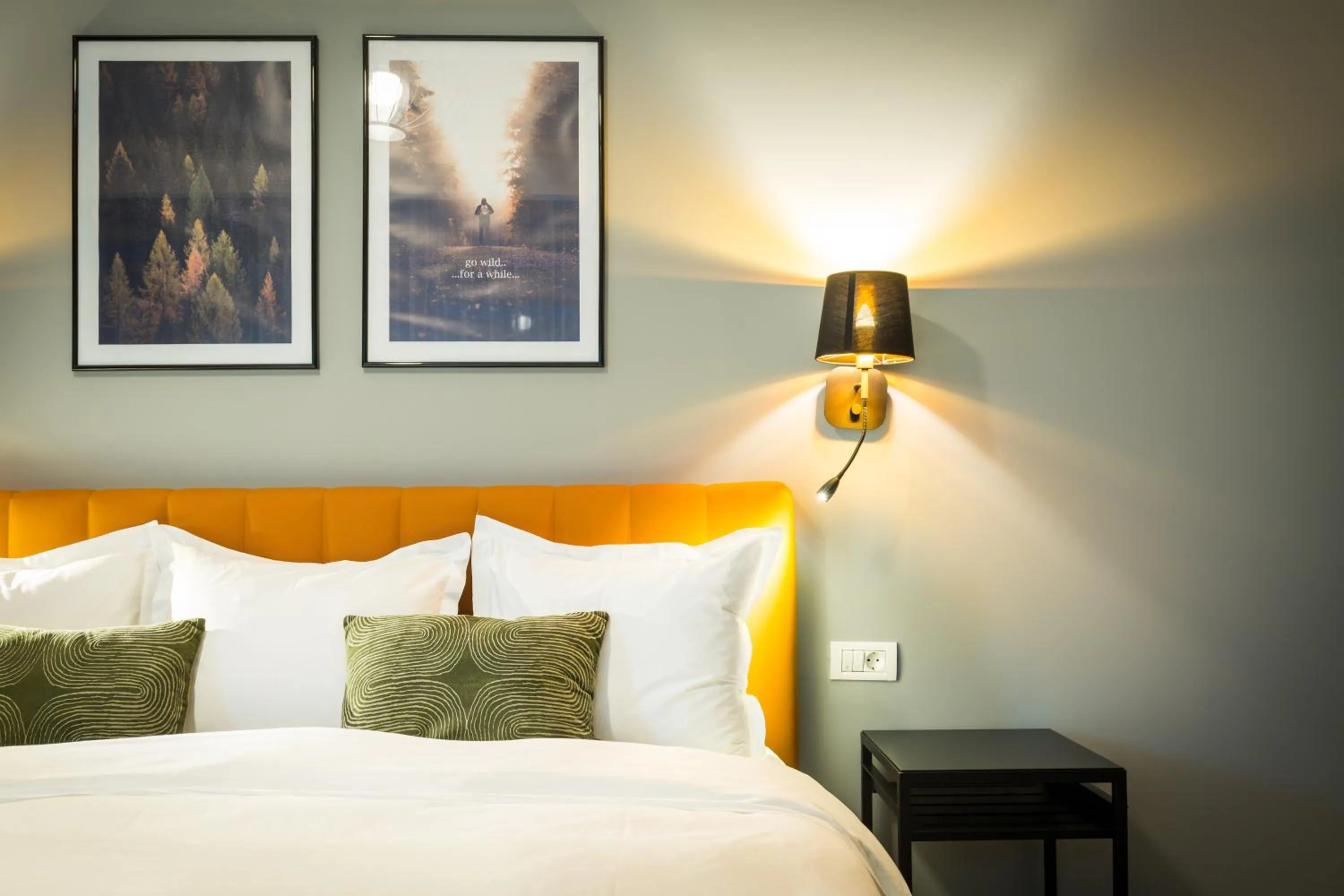 Bed in UpperHouse Suites & More