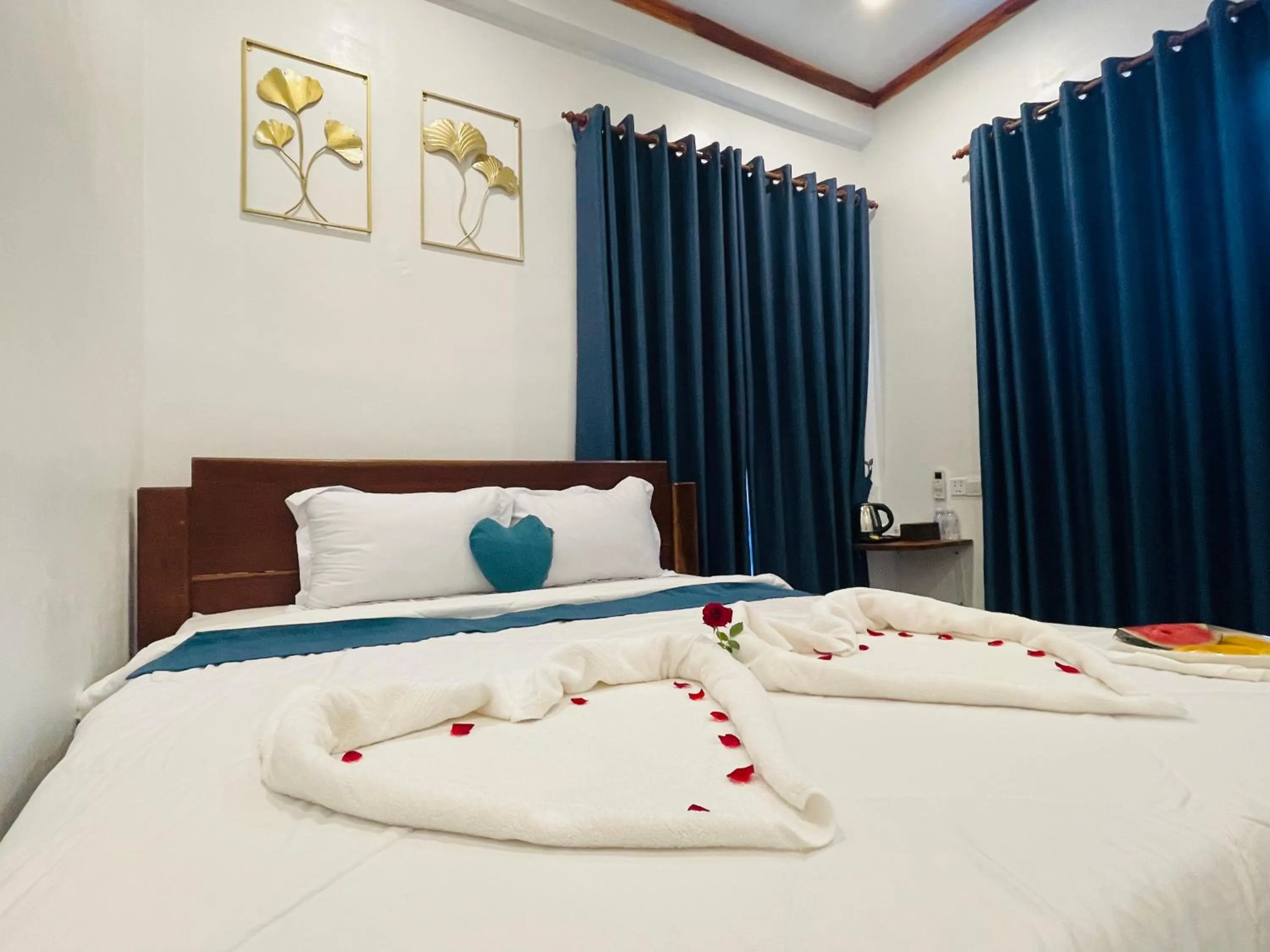 Bed in Kampot River Bungalow by MAMA